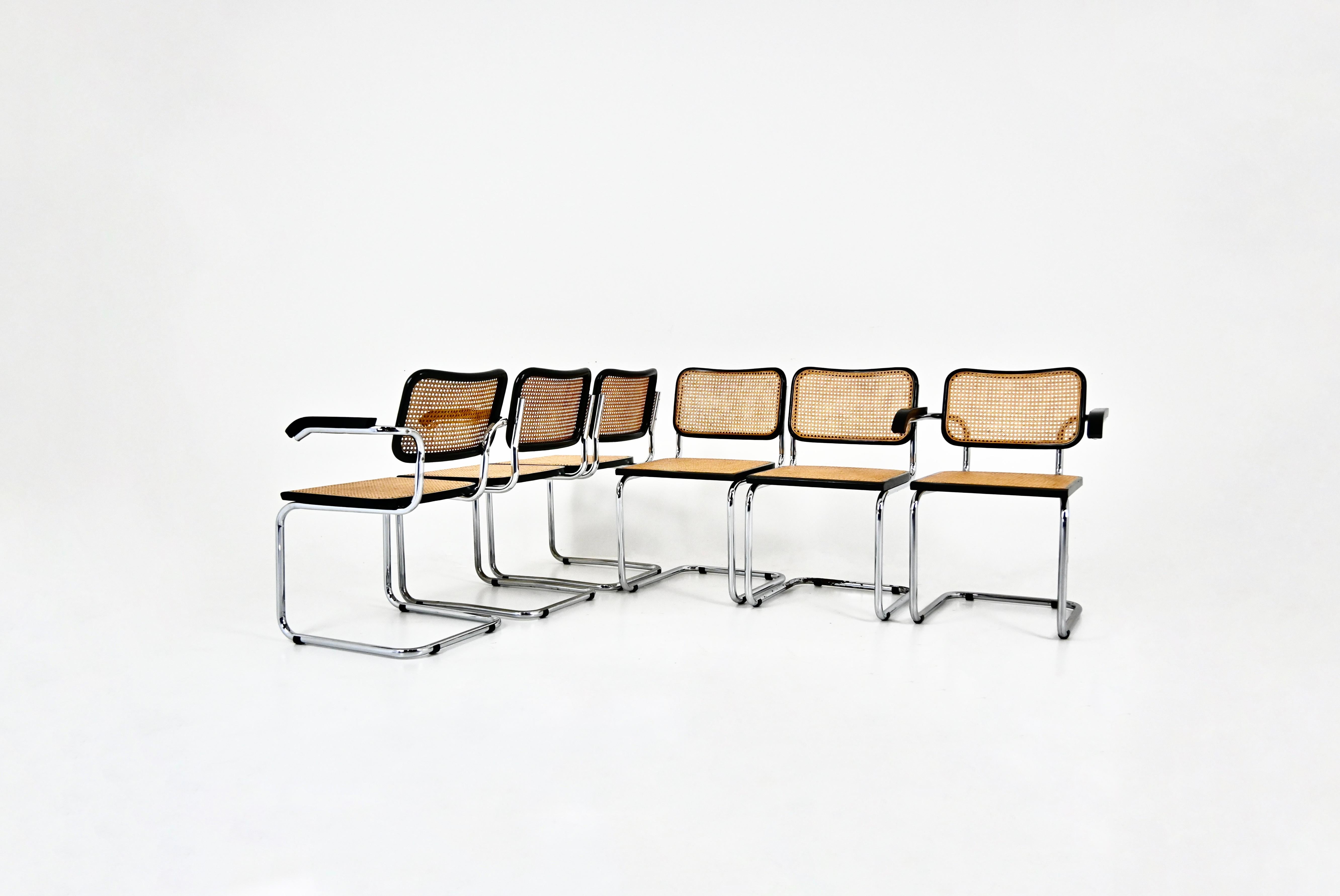 Set of 6 chairs in metal, wood and rattan. 
Dimensions: seat height: 46 cm. Width with armrests : 62 cm 
Wear due to time and age of the chairs. 
FOR SHIPPING, REQUEST US FOR RECEIVE THE BEST PRICE




