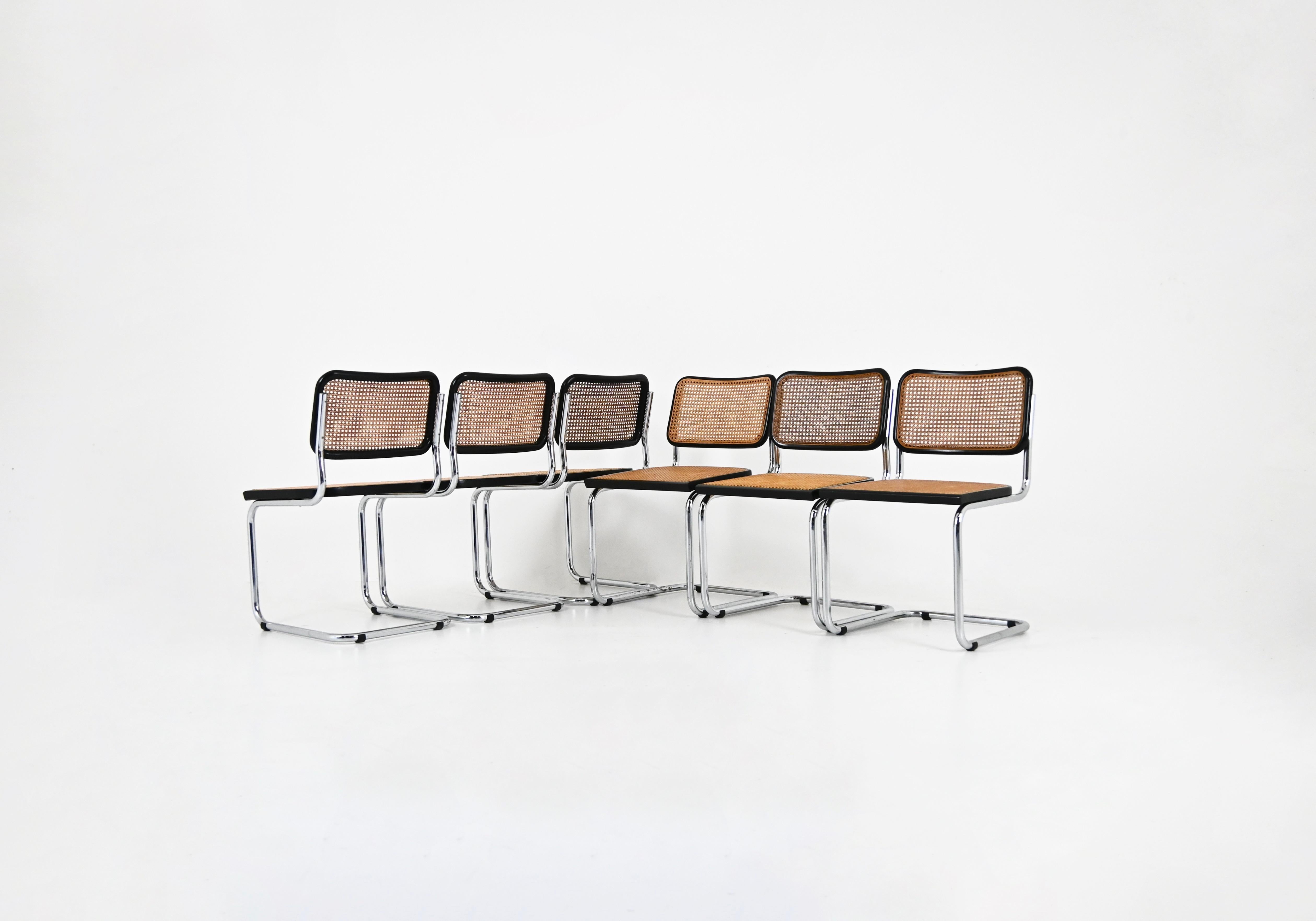 6er-Set  Stühle aus Metall, Holz und Rattan. Sitzhöhe: 45 cm. Abnutzung durch die Zeit und das Alter der Stühle. 
FÜR DEN VERSAND, FRAGEN SIE UNS, UM DEN BESTEN PREIS ZU ERHALTEN
