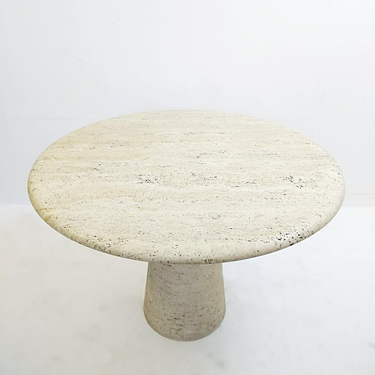 Dining pedestal table in travertine, Italy 1970s.