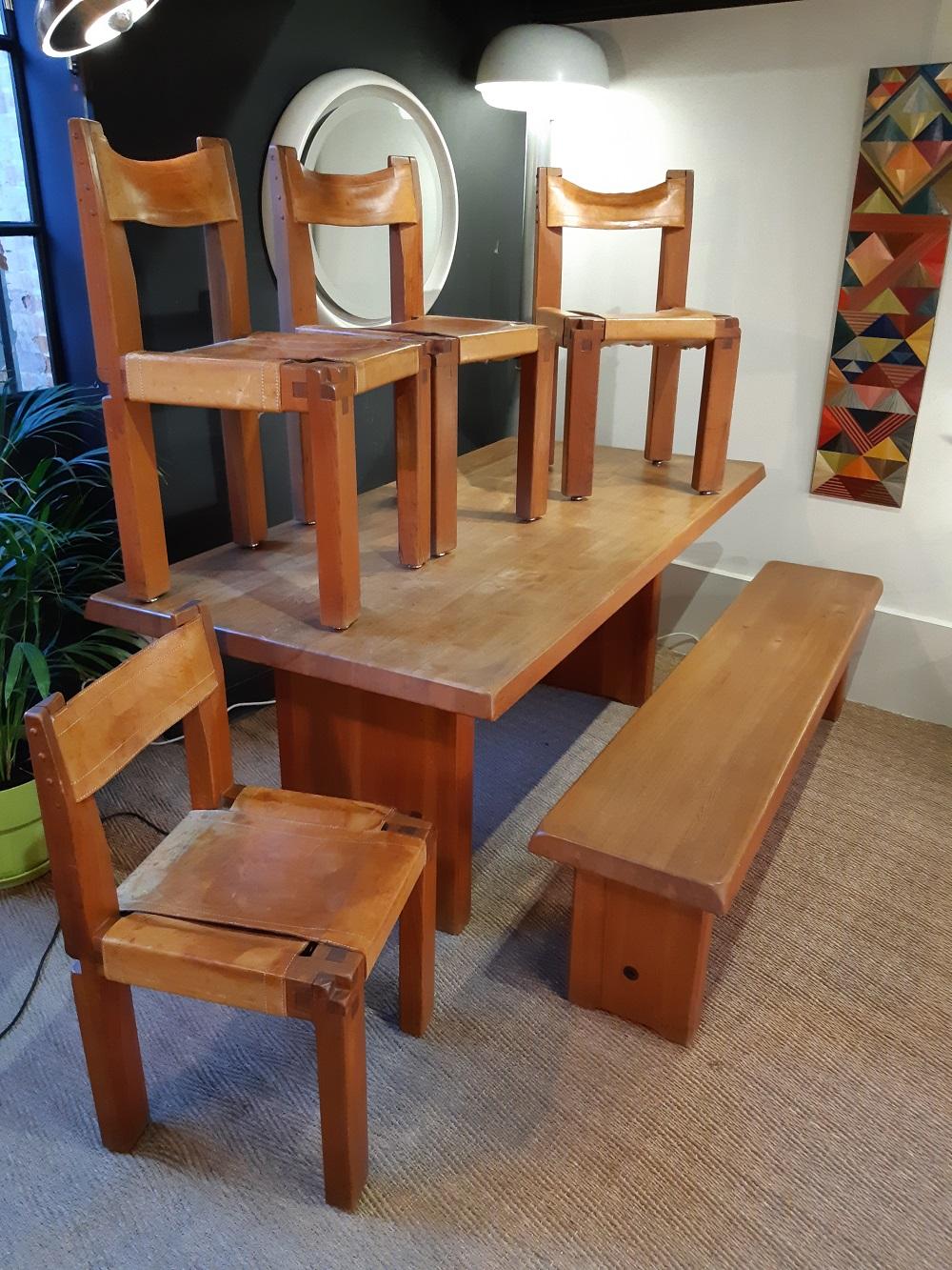 A rare complete dining room set by Pierre Chapo.
3 chairs S11, 1 table T14, 1 bench S14 matched. Authentic pieces from the 60s in solid elm.
Signs of wear and traces of glass on the table.
Good patina on the leather with traces of use.
(There