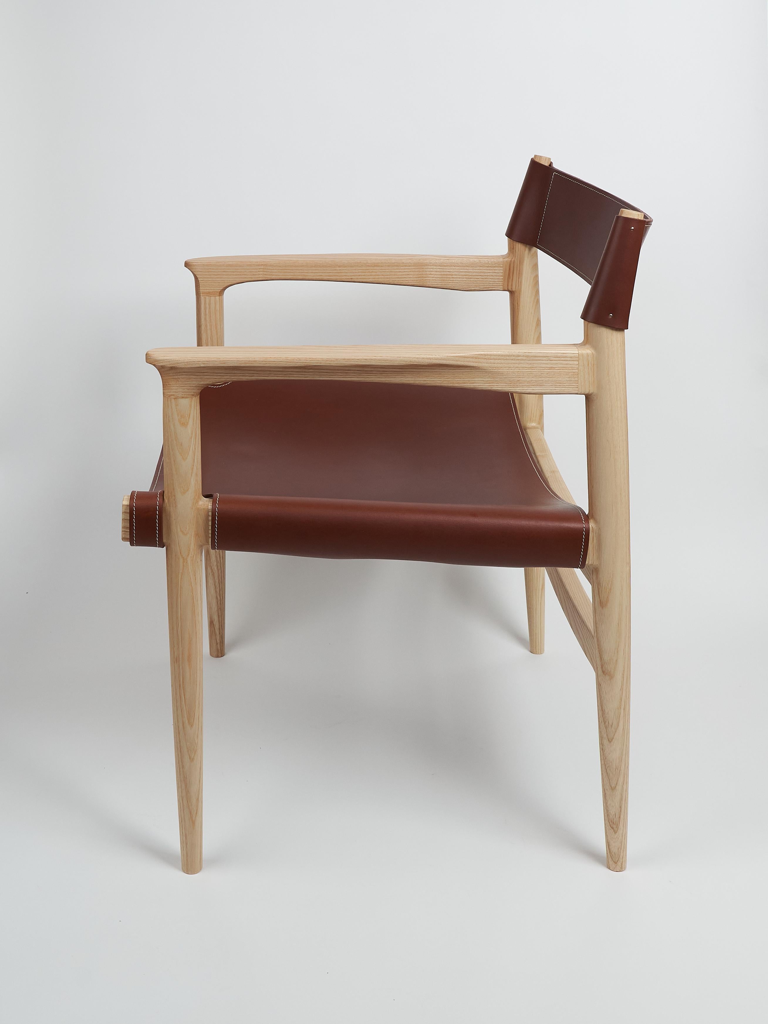 North American Dining room chair in ash with the sling leather seat For Sale