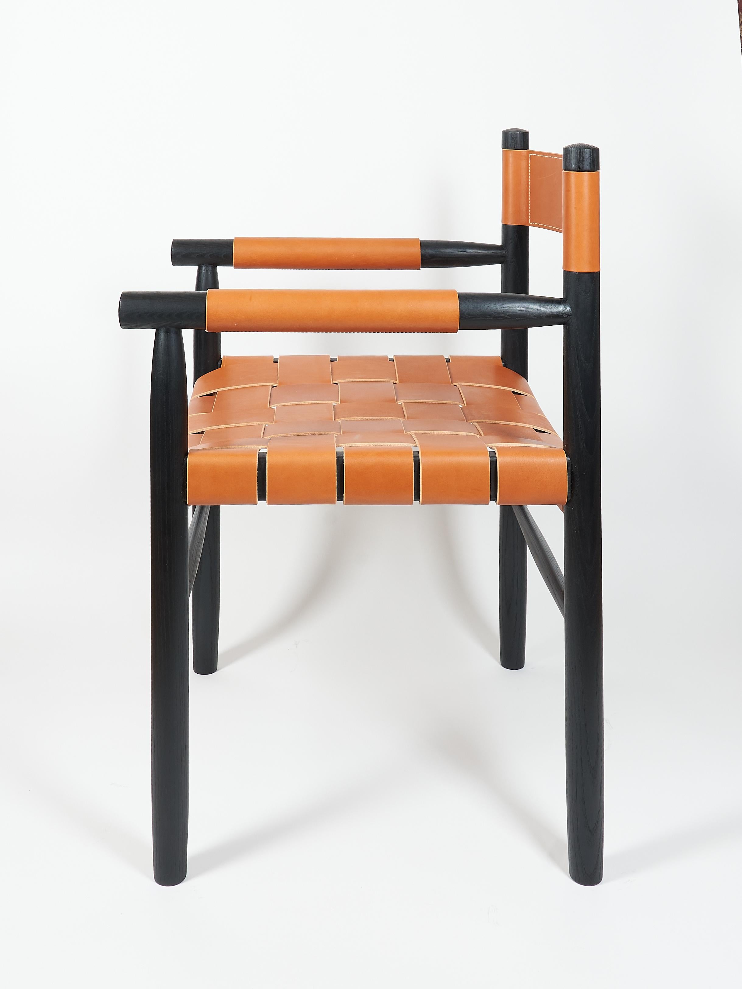 Scandinavian Modern Dining room chair in ebonized ash with the woven leather seat and backrest For Sale