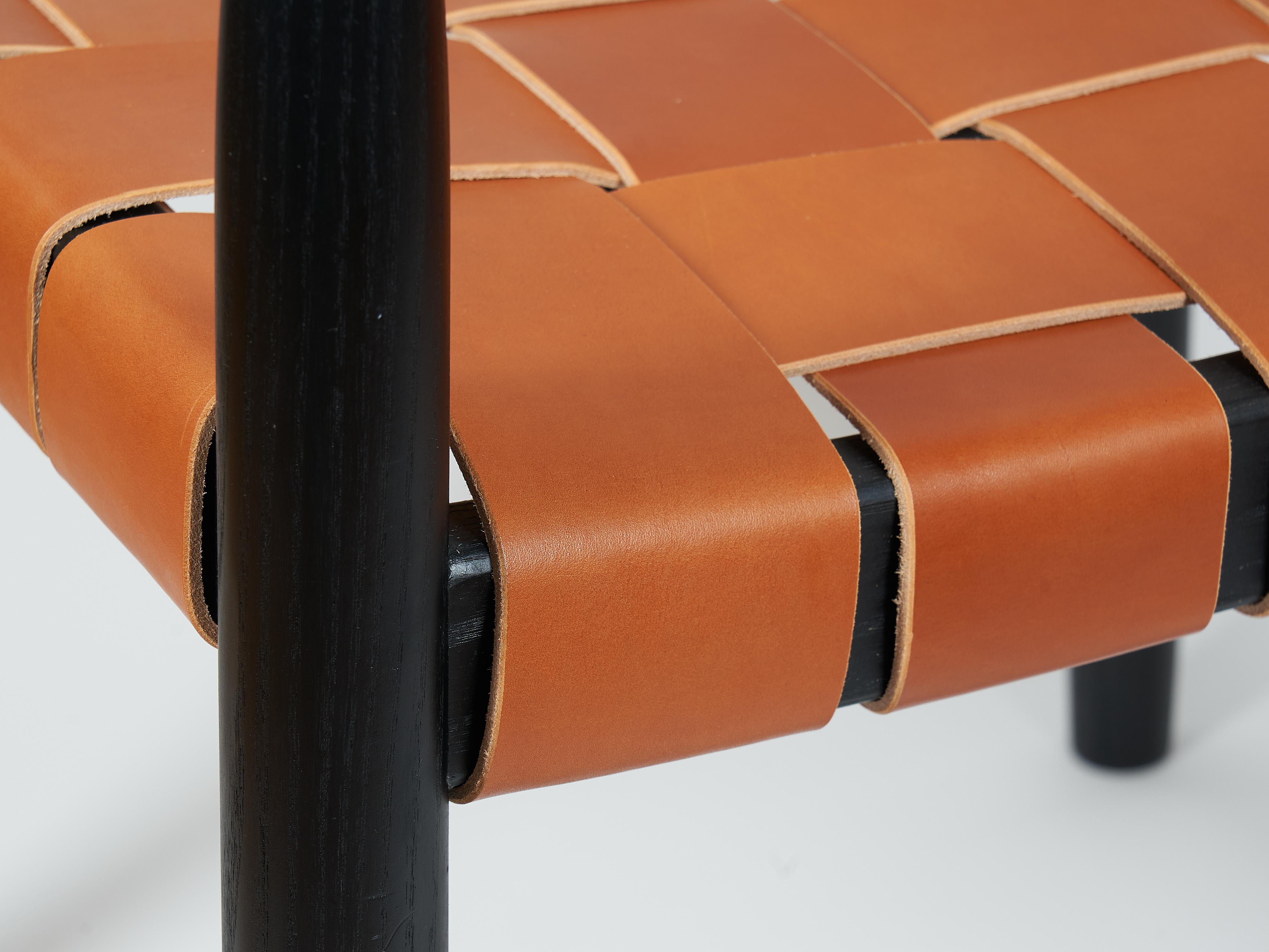 Sapele Wood Dining room chair in ebonized ash with the woven leather seat and backrest For Sale