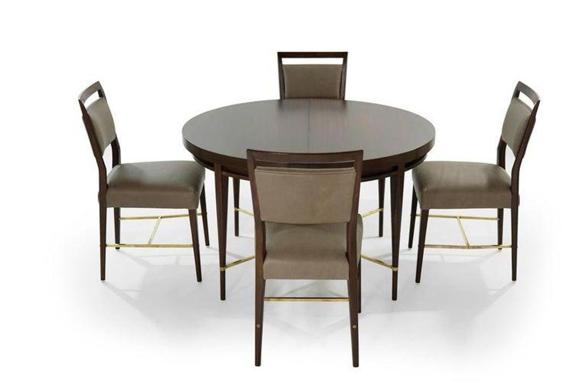 Elevate your dining experience with our exquisite seven-piece dining set, a vintage masterpiece designed by the renowned Paul McCobb for The Calvin Group, dating back to the illustrious era of 1950-1959. Meticulously restored to its former glory by