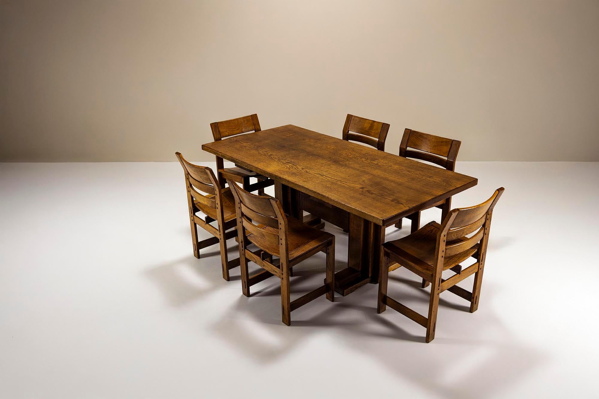 Officina Rivadossi, founded by Giuseppe Rivadossi, has built its reputation on traditional woodworking, material clarity, and a deep respect for handcraft. This dining room set—consisting of a solid oak table and six dining room chairs—exemplifies