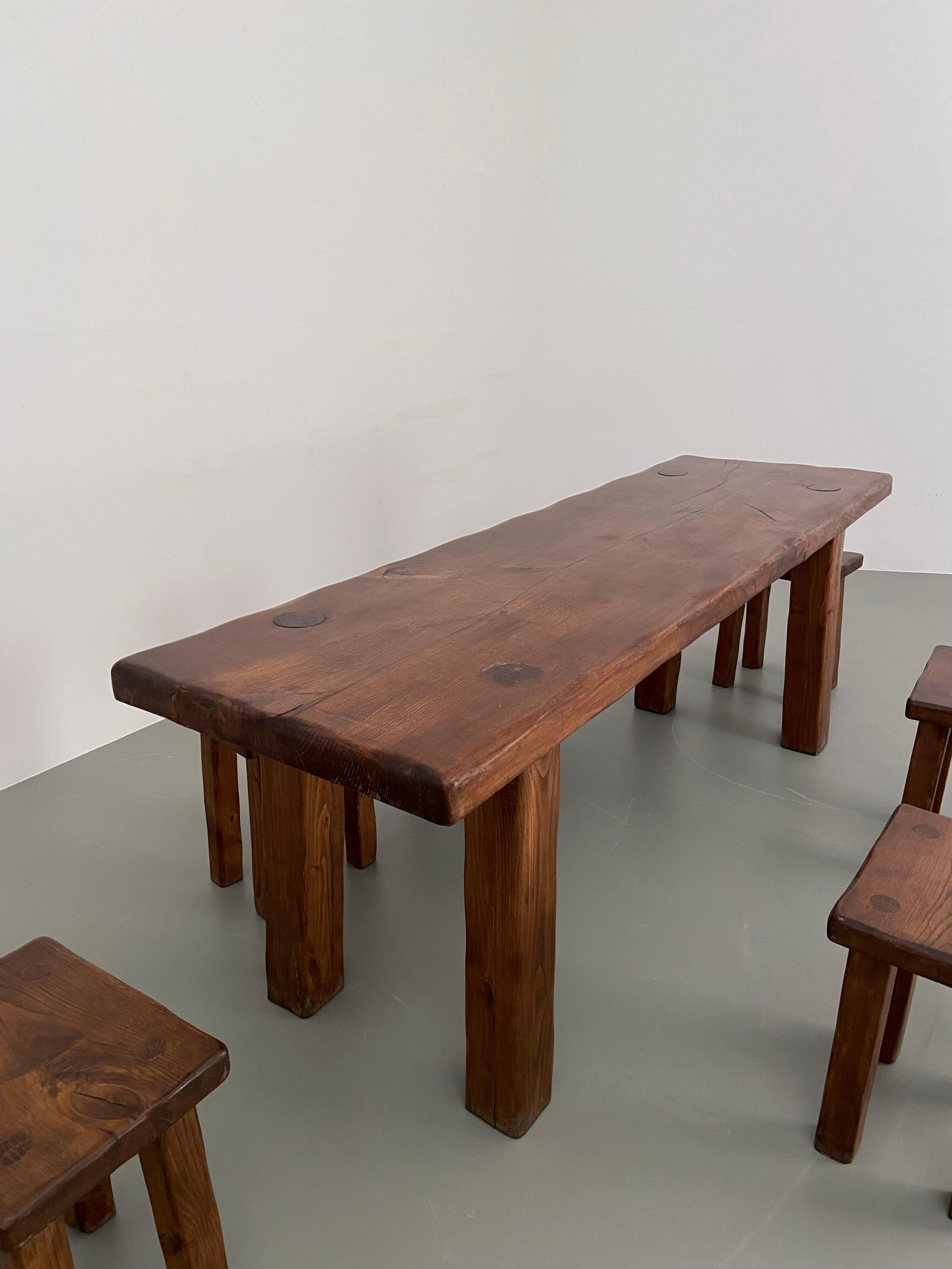 French Dining Room set in solid Elm including 6 stools, France, 1970's For Sale