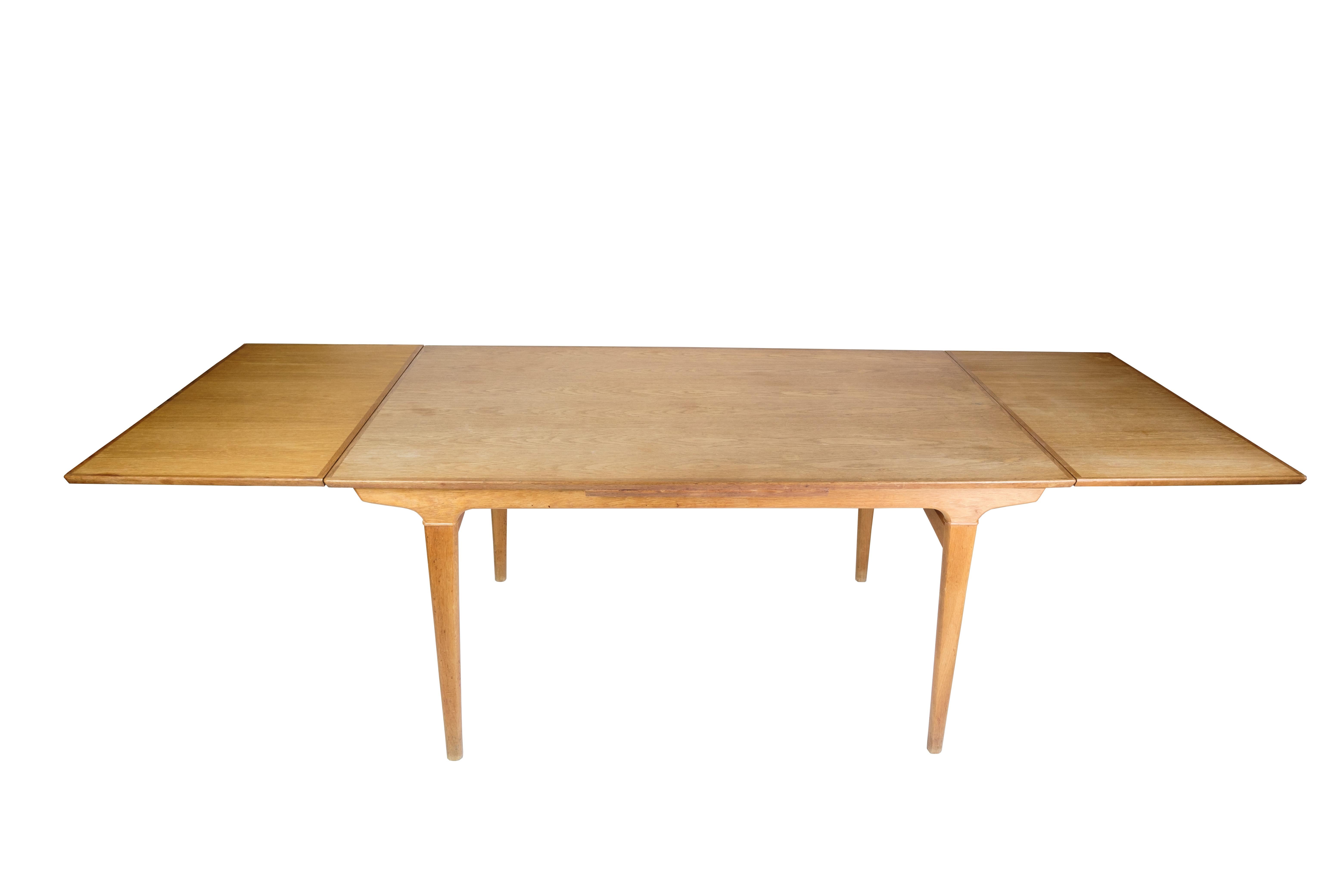 Mid-Century Modern Dining Room Table Made In Oak By Johannes Andersen From 1960s For Sale