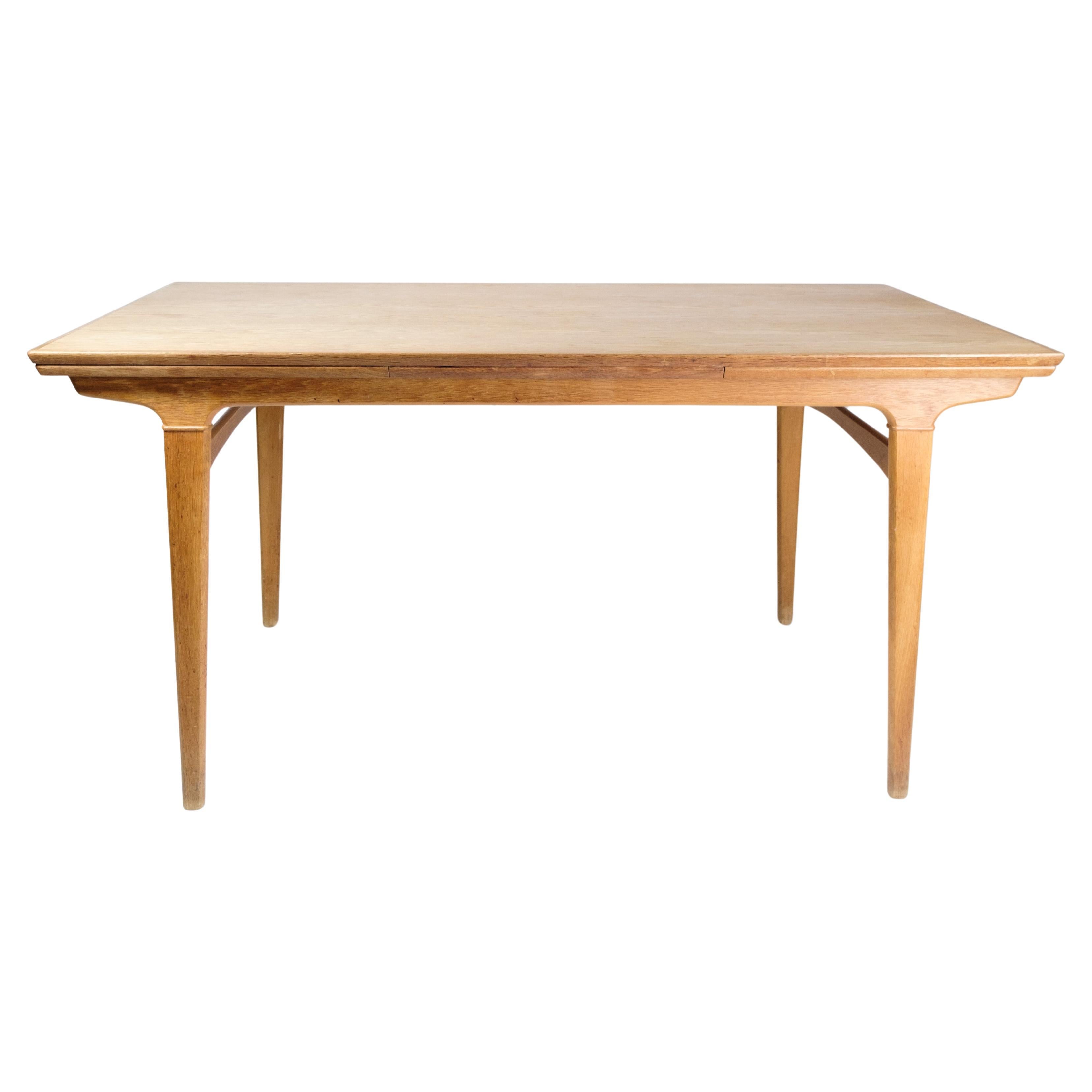 Table de salle à manger en chêne de Johannes Andersen des années 1960