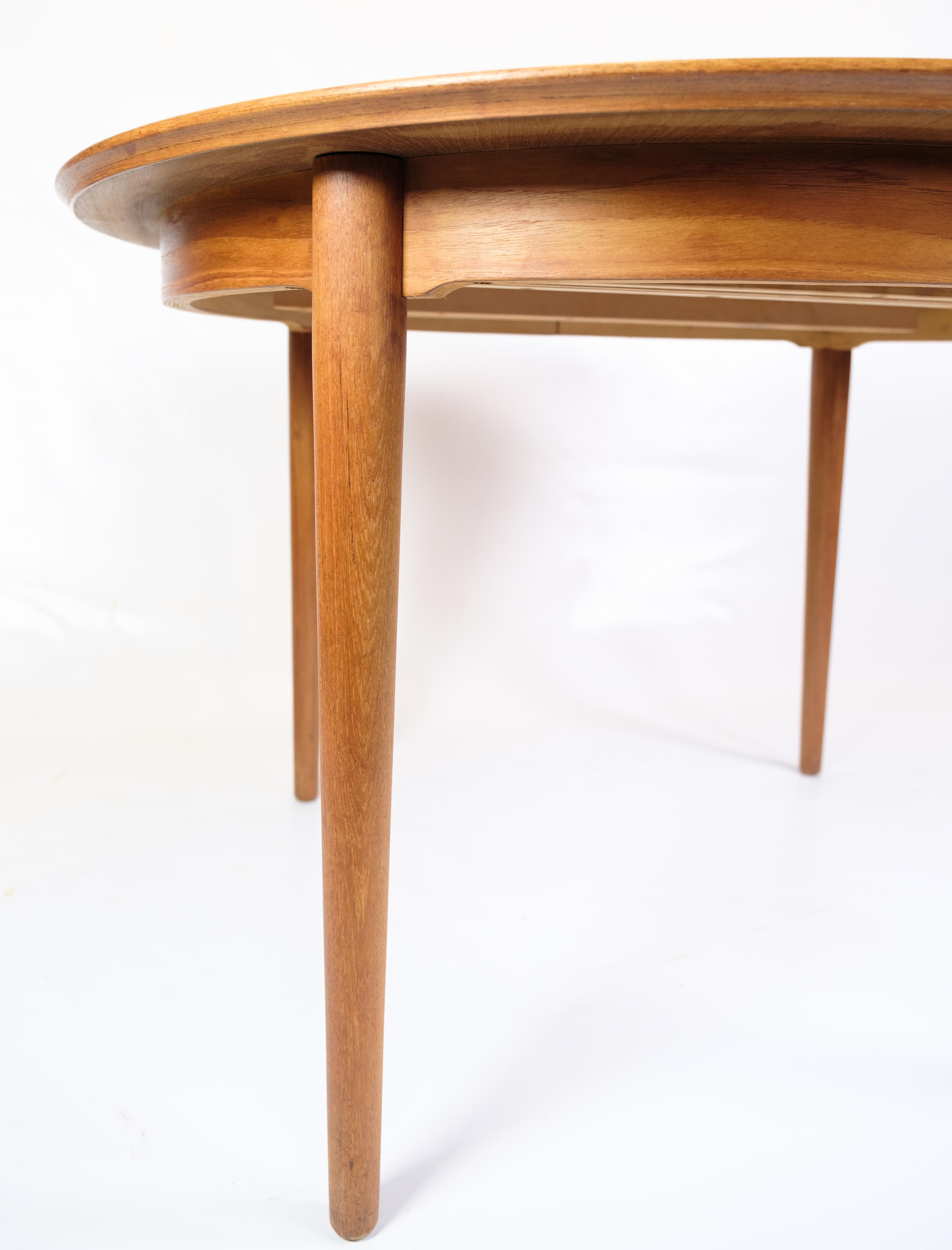 Danish Dining Room Table Made In Teak With Extensions By Arne Vodder From 1960s For Sale