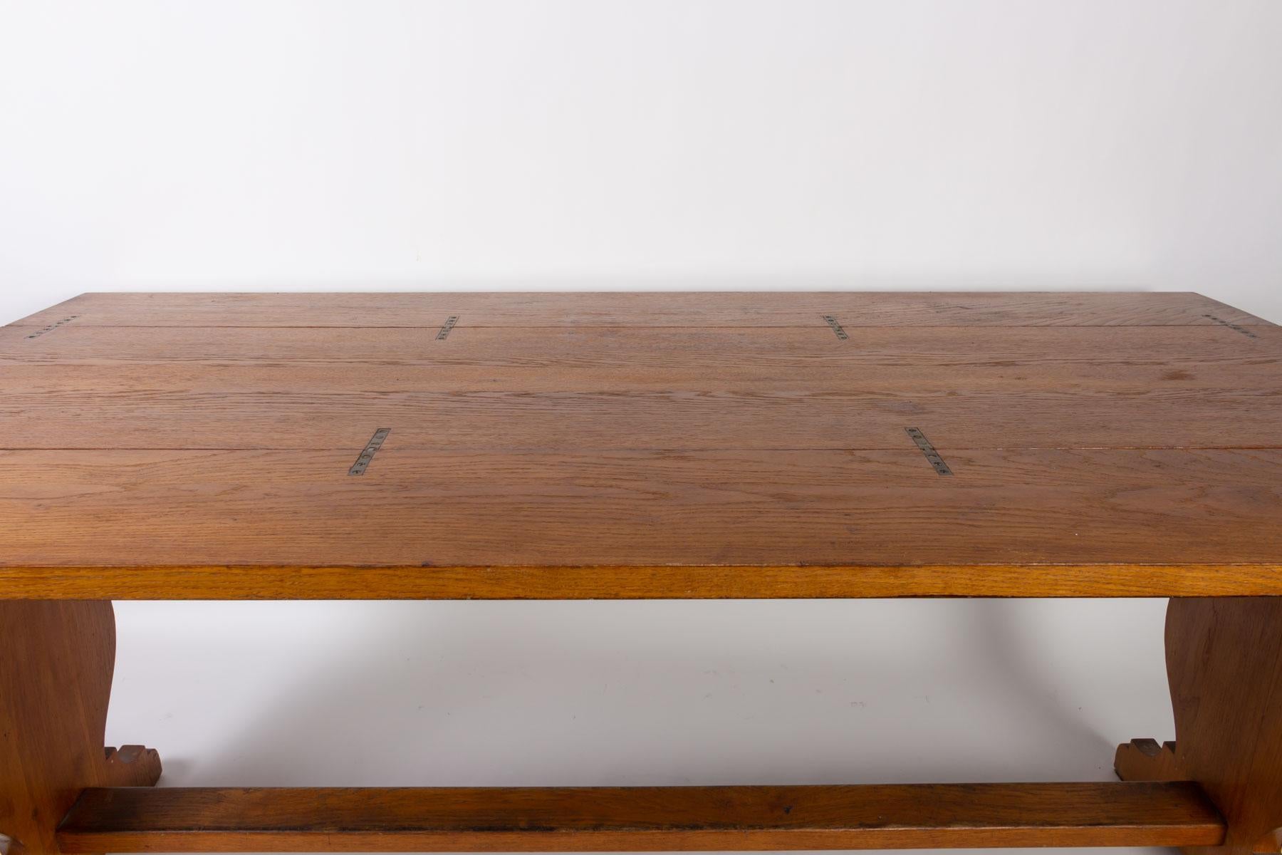 Oak dining room table, Robert Guillerme & Jacques Chambron, 1960.

Measures: H 74 cm, L 170 cm., L closed 44 cm., L open 89 cm.