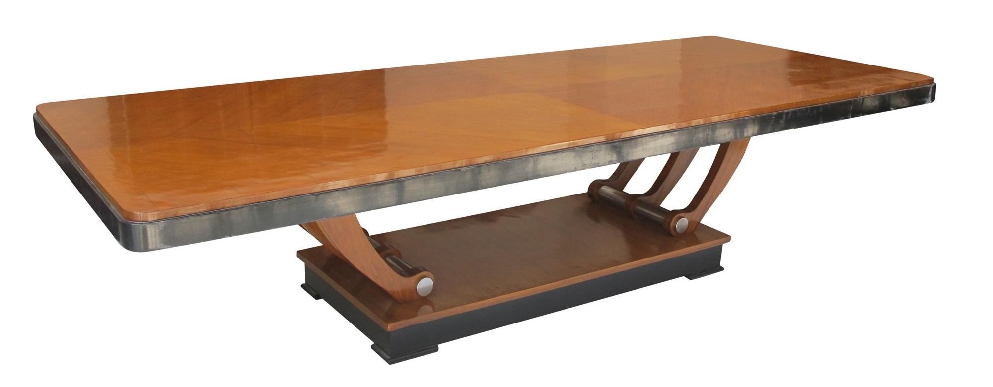 Dining table Art Deco

It is delivered re-polished
Year: 1920
Country: French
Wood 
Finish: polyurethanic lacquer
It is an elegant and sophisticated dining table.
You want to live in the golden years, this is the dining table that your project