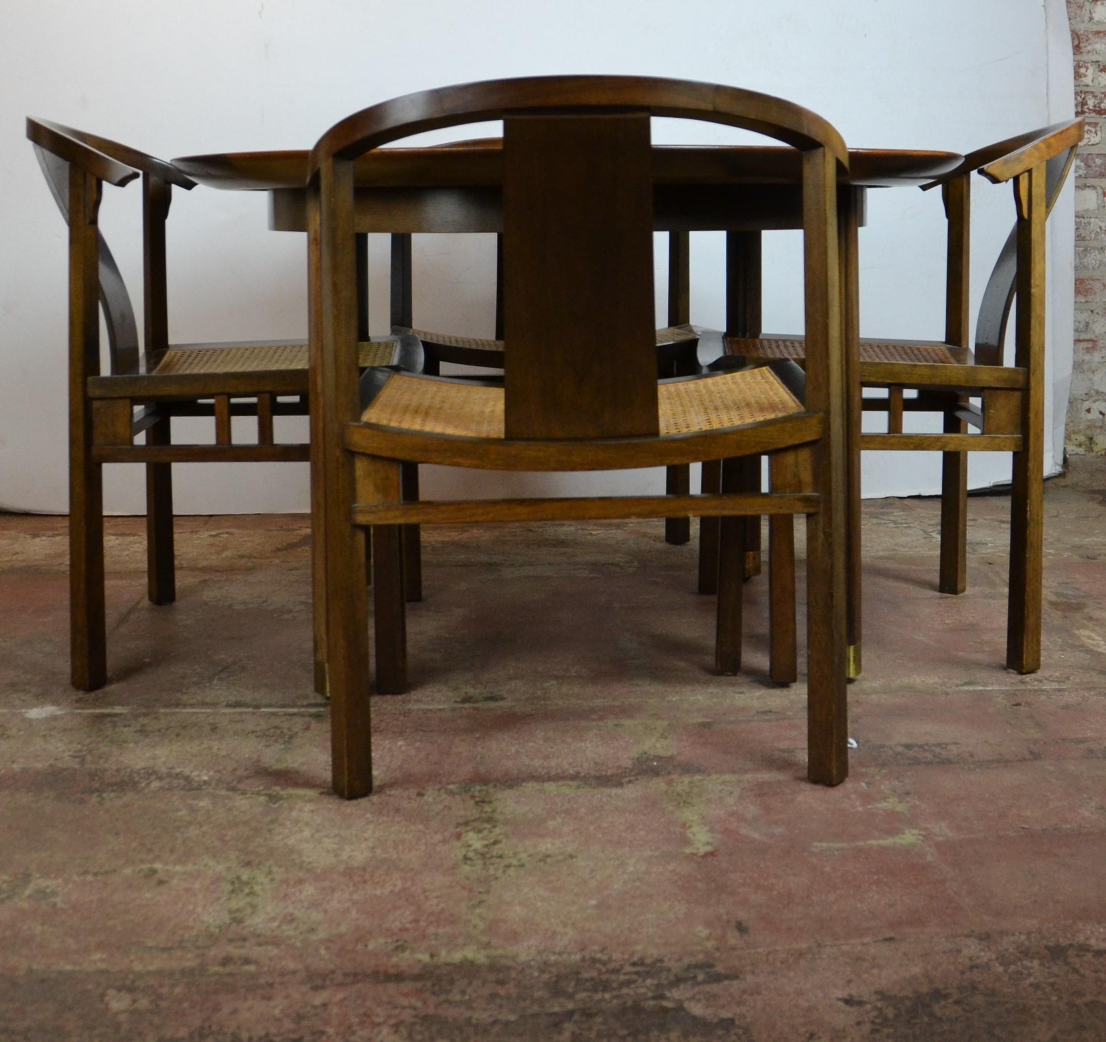 Dining set designed by Michael Tayler for Baker. The table has two leaves 14
