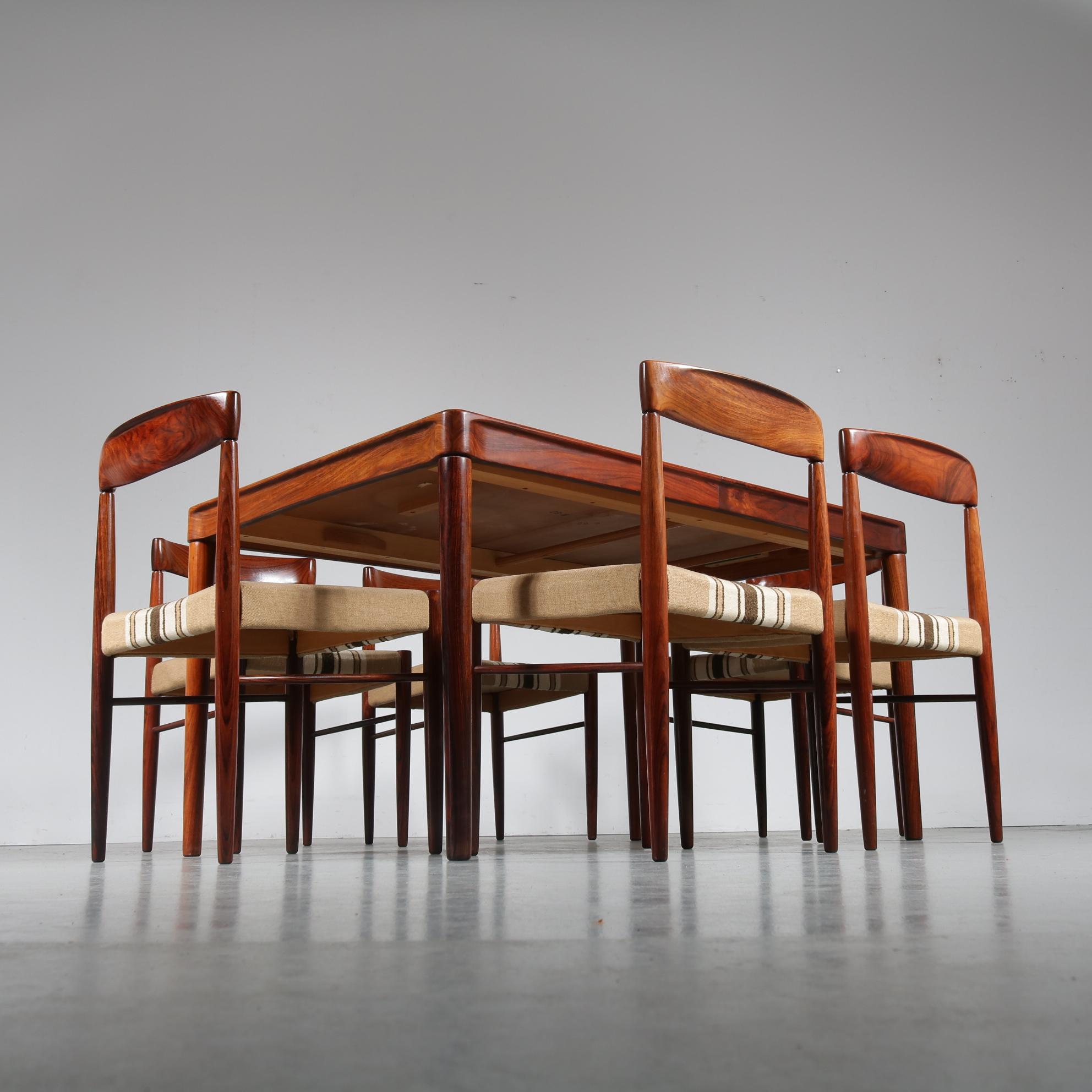 A beautiful dining room set designed by H.W. Klein, manufactured by Bramin in Denmark, circa 1960.

This luxurious set contains one extendible dining table and six dining chairs. The table is completely made of the highest quality tropical hardwood