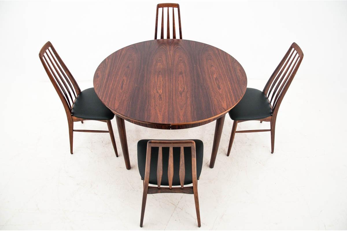 Dining set, Niels Koefoed, Denmark, 1960s. Chairs and table are kept in very good condition, new black leather upholstery. Table with beautiful graining, gained a lot after renovation. In set included 2 inserts that allow to extend the table up to