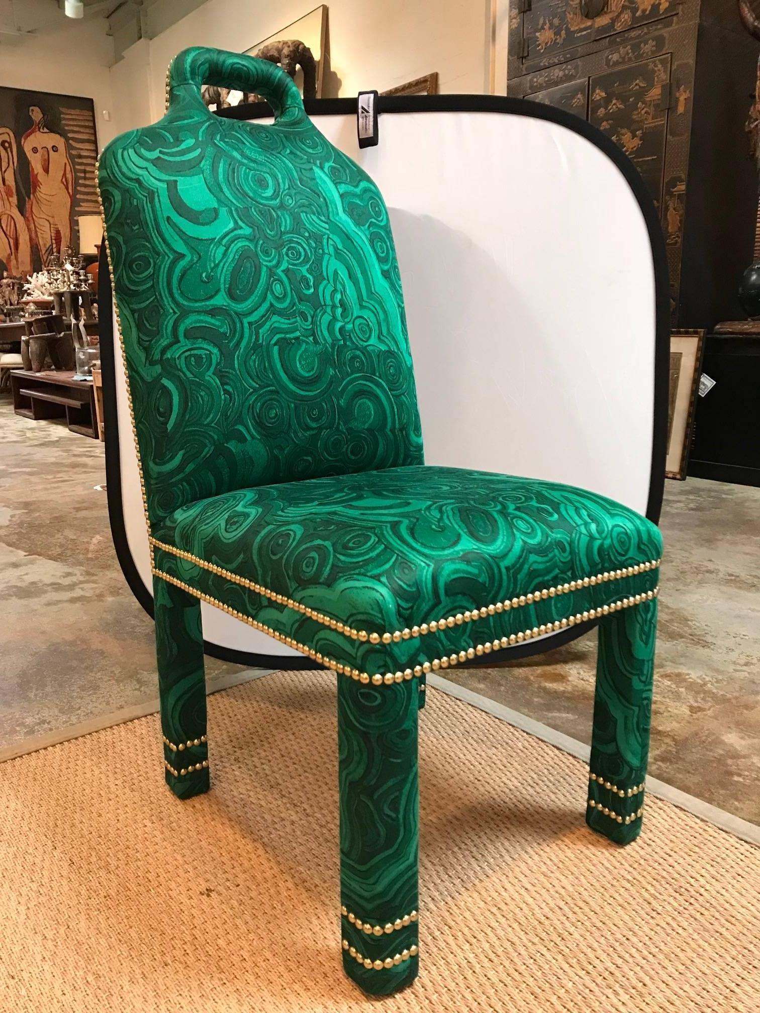 Custom designed side chair by Michelle Nussbaumer. 
Upholstered and nail trim details.
Open area at top back.