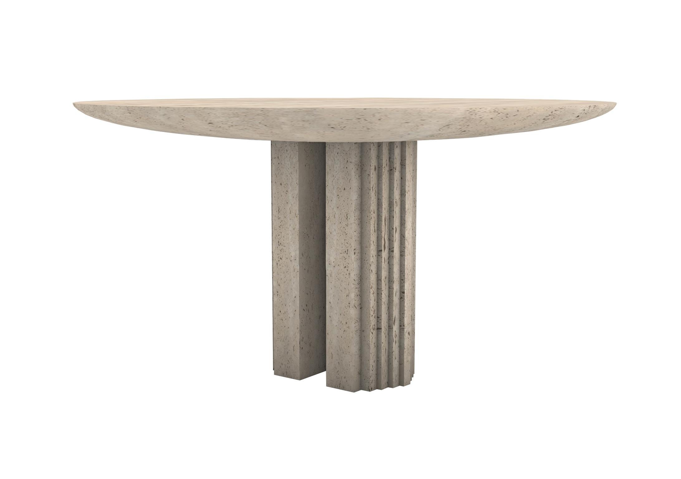 “Dining table 0024c” is a sculptural table in Travertine created by the artist Desia Ava. 
The piece features strong lines and gentle curves. Marked by architectural aesthetics, on the borderline between sculpture and furniture the Marble block has