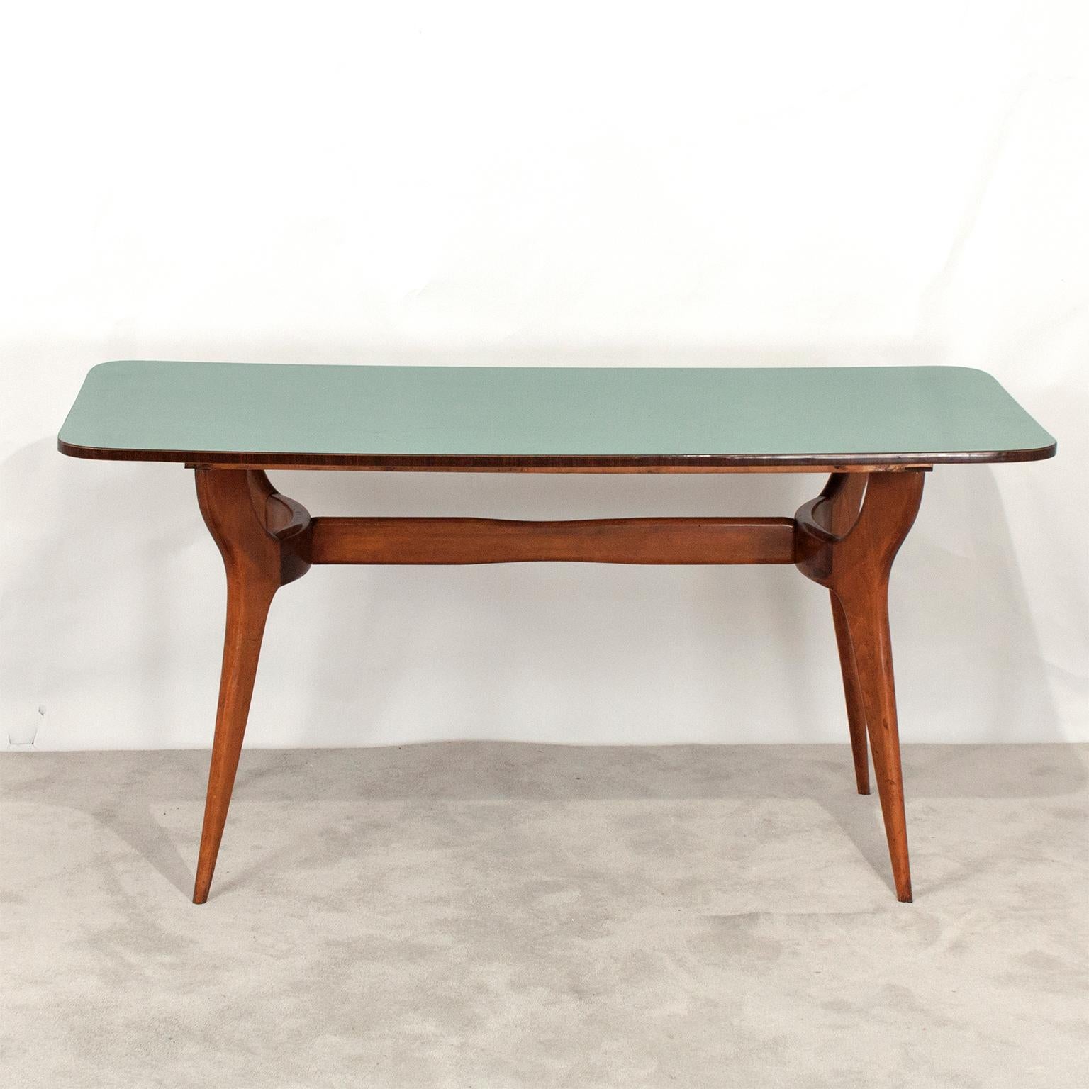 Italian dining table, produced in the 1950s. Feet with organic shape and Formica envelope in green. In the style of Ico Parisi.
It can also be used as a desk.
 
  
