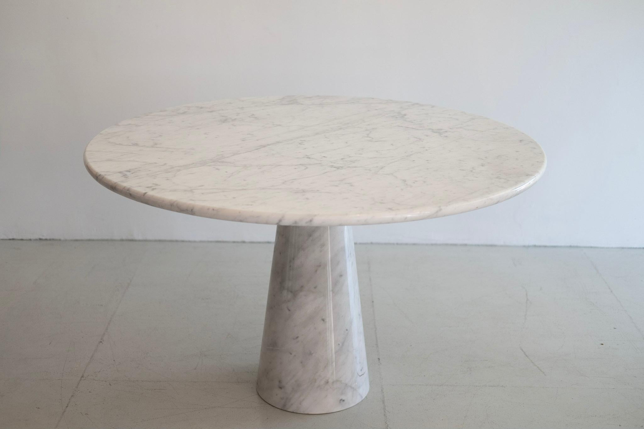 Marble dining table by Angelo Mangiarotti.
Pedestal base with round Carrara marble top.