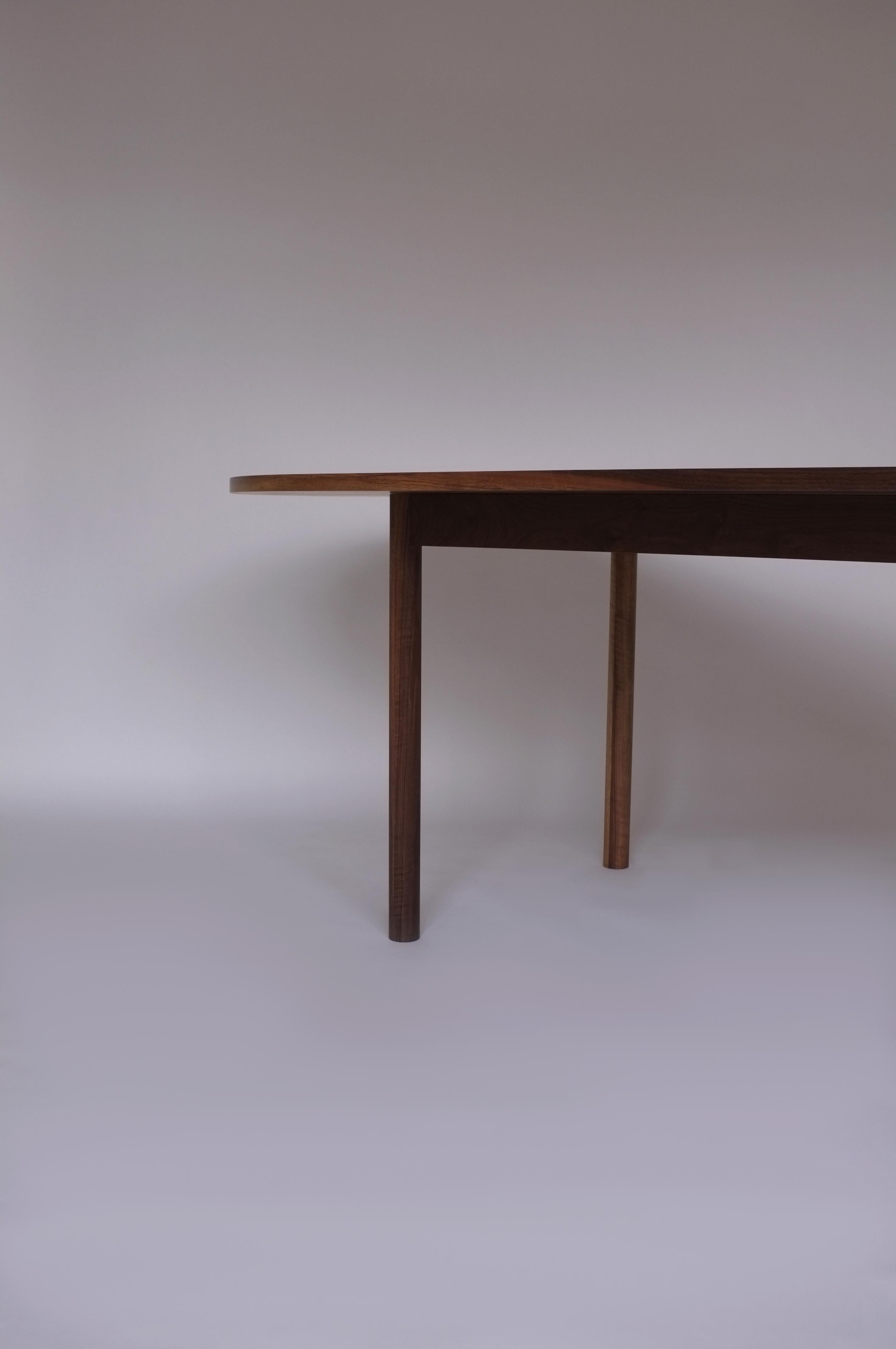 Dining Table by Campagna, Contemporary Minimal Pill Shaped Walnut Wooden Table In New Condition In Portland, OR