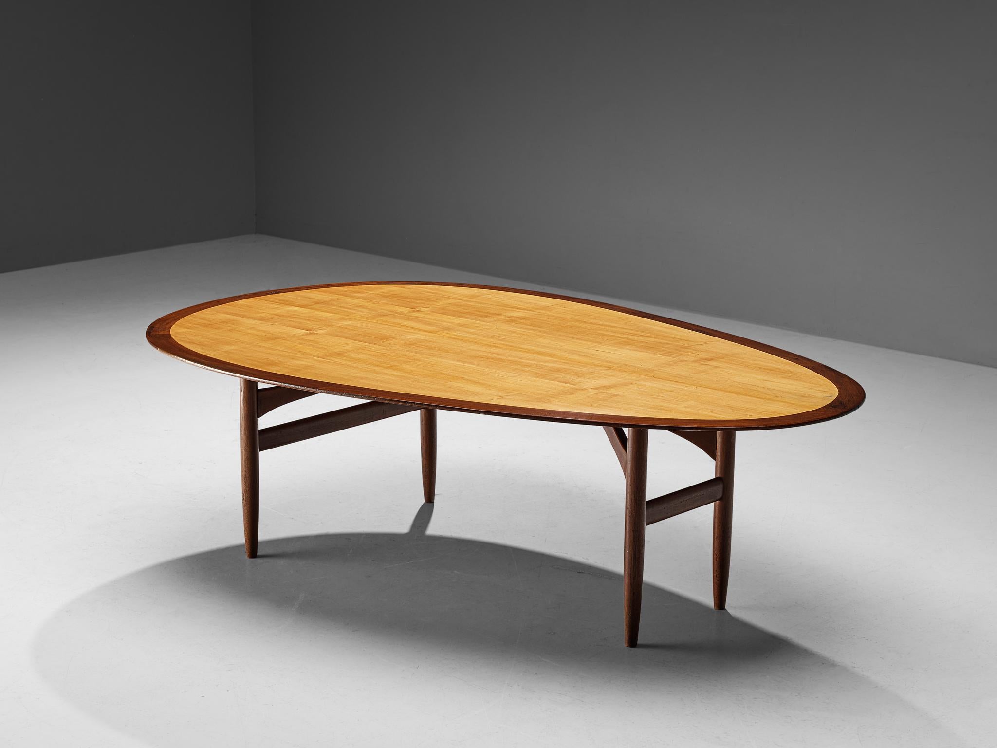 Cabinetmaker, dining table, maple, teak, Denmark, 1940s

This dining table was designed by a Danish furniture maker, whose identity is unfortunately not yet known. The designer clearly understood how to design a high-quality piece of furniture. The