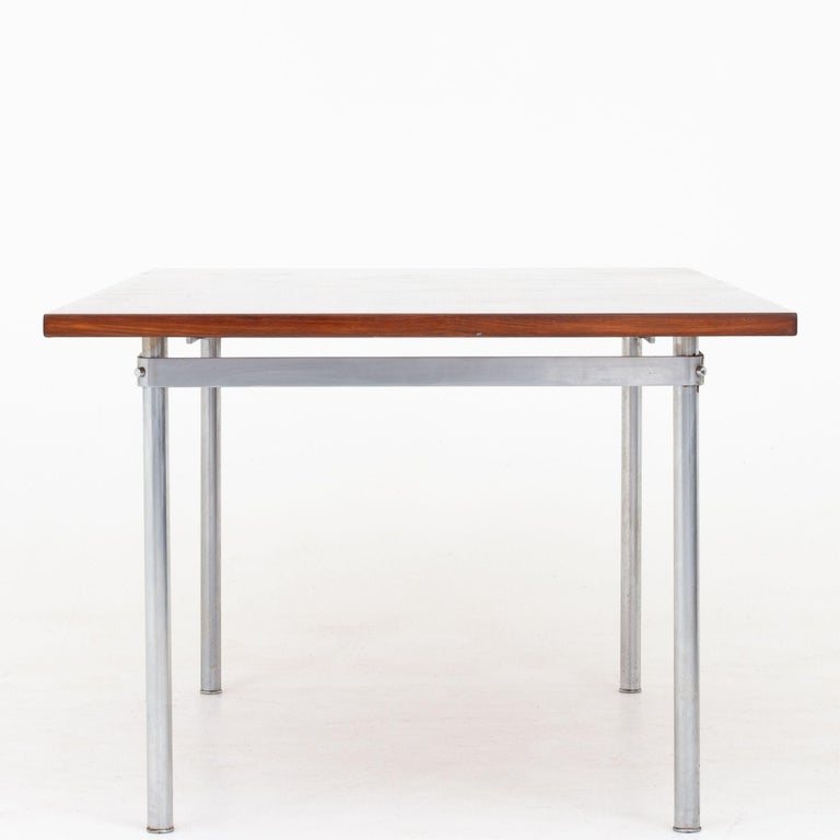 AT 318 - dining table in Brazilian rosewood w. frame of steel. Hans J. Wegner / Andreas Tuck