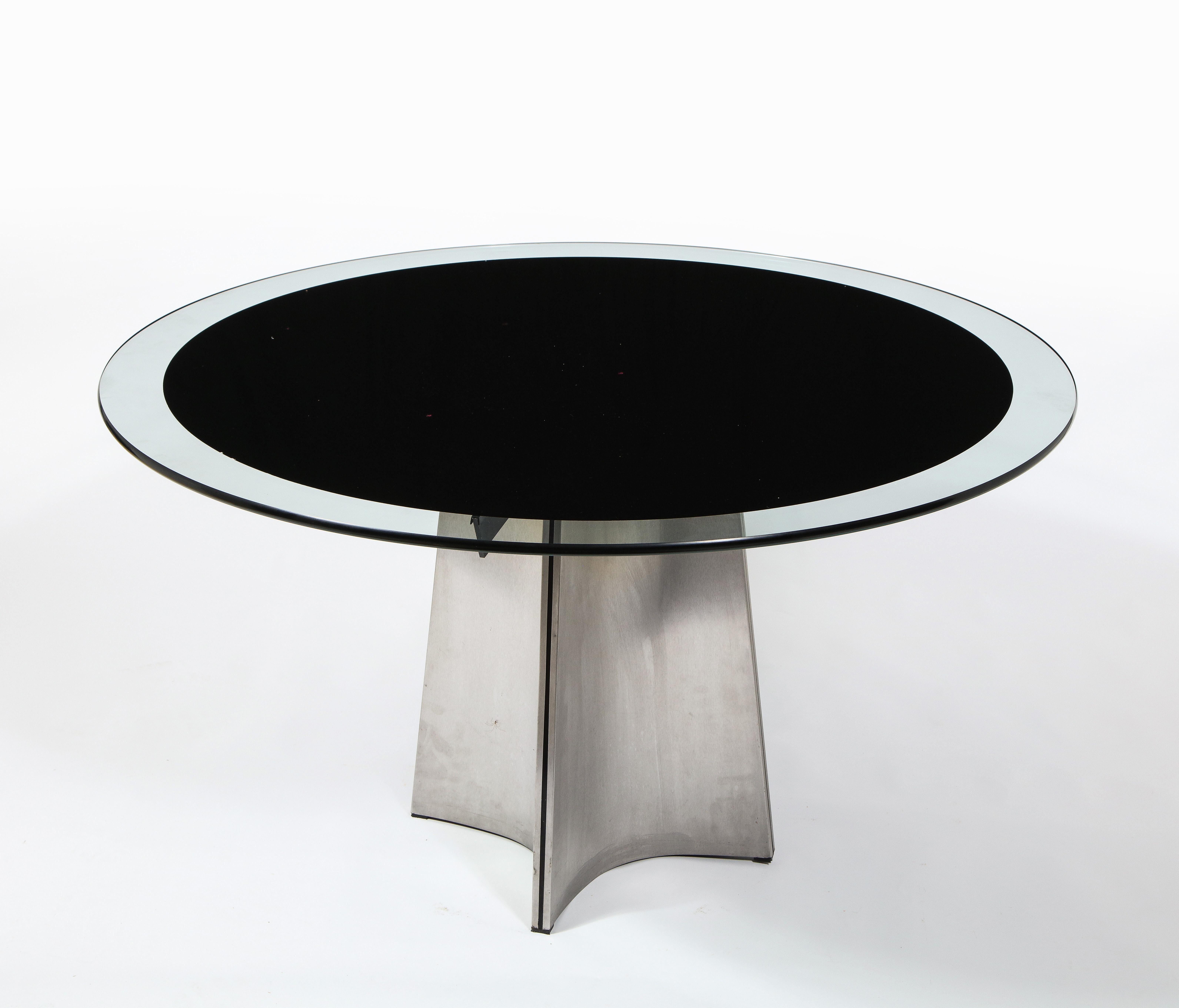 Round thick glass top with black enamel, brushed steel
Dimensions: 28 in high x 58.5 in diameter.