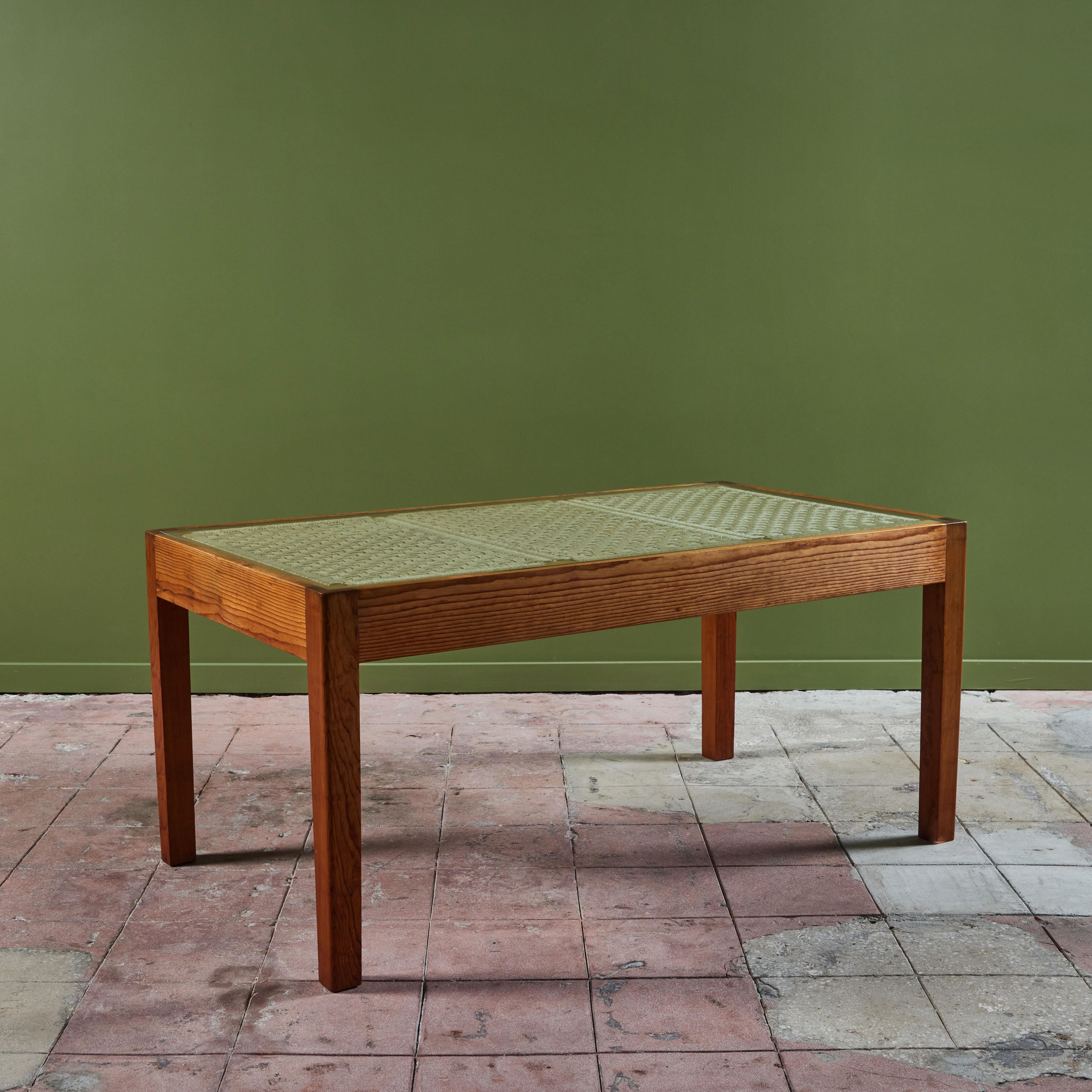 Bauhaus trained, Mexico City based designer Michael van Beuren created highly functional modern pieces inspired by Mexican vernacular styles and materials. This example is a dining table with a rectangular pine frame. The under-frame of the table is