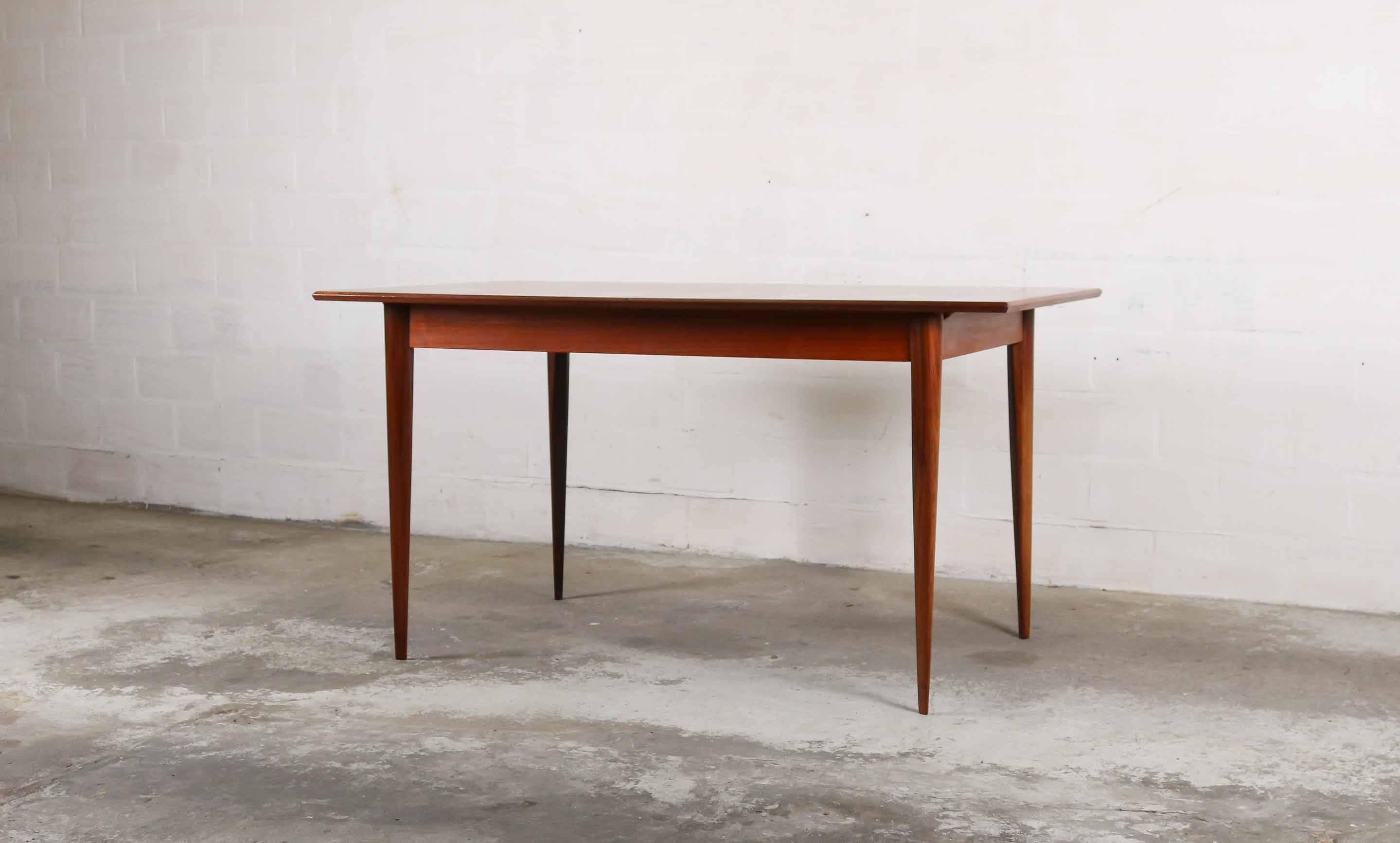 Table of Belgian designer Oswald Vermaercke for V-form.
Made from teak wood. The table can be extended (measure: width 140-190 cm).

 