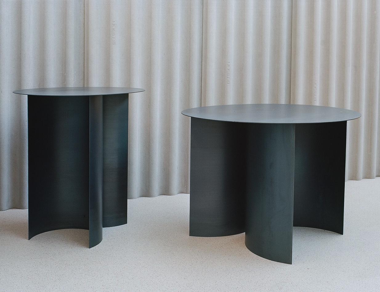 Dining table pi by Part Studio Atelier
Dimensions: H75 x D120 cm
Materials: blue rolled steel
Images by: Valentina Stellino

These tables are truly an optical experience. Guiding your gaze in, up, down and around the wavelike motions. Grace to
