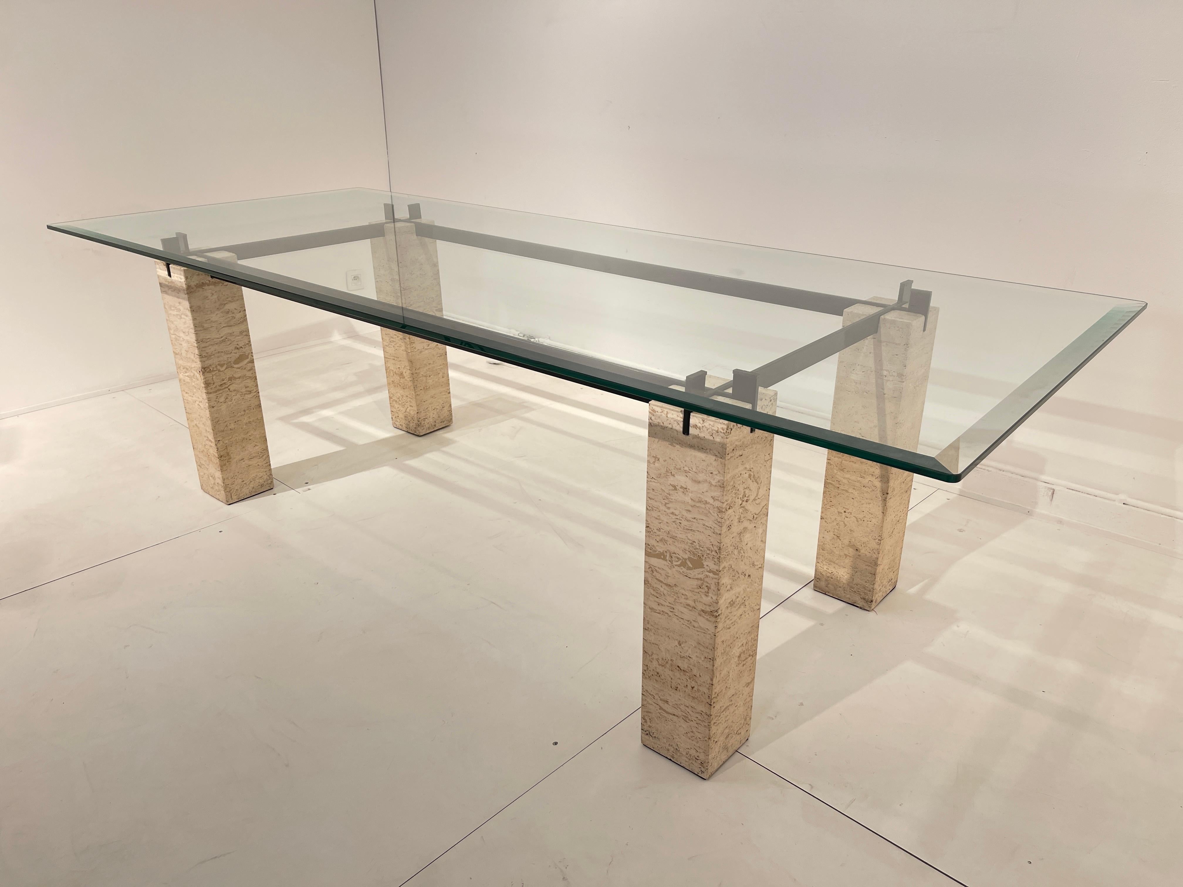 Nice dining table by Renato Polidori for Skipper. top glass and travertine marble,
two repair on two feet, see pictures. The color metal is in 