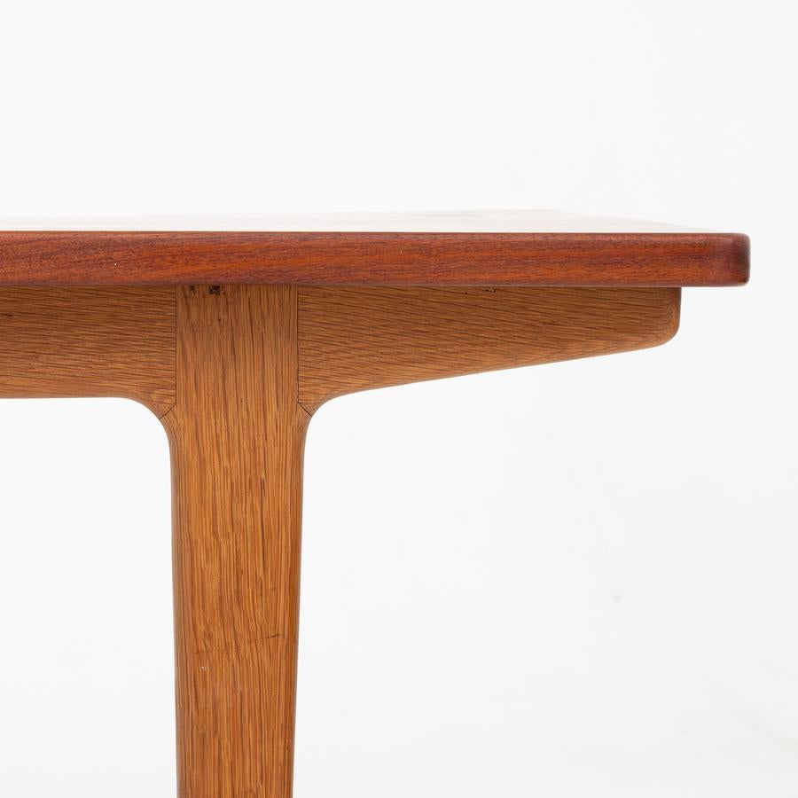 Dining table in solid teak w. frame of oak. Attributed to architects Tove & Edvard Kindt-Larsen.