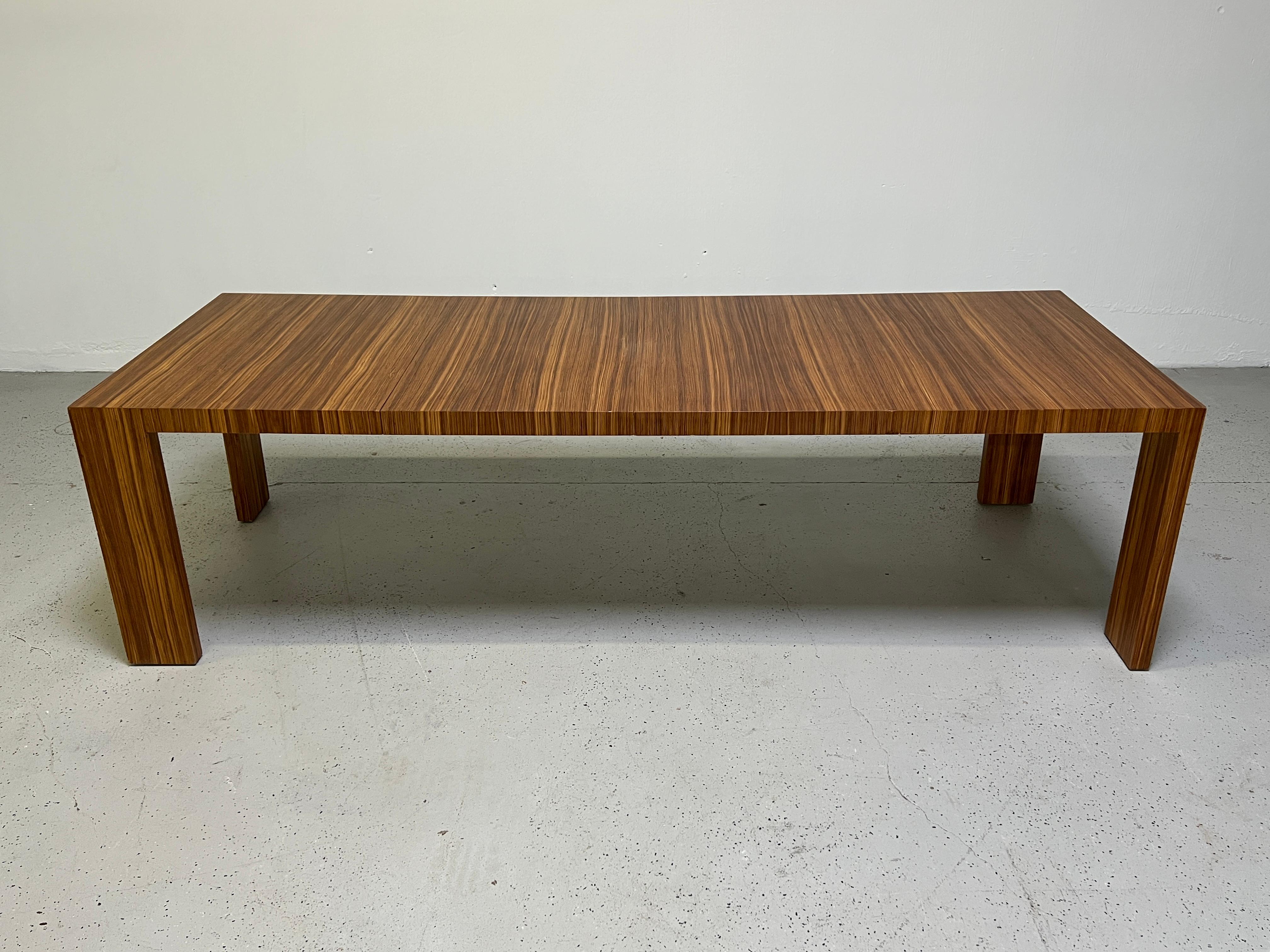 A beautifully grained dining table designed by Vladimir Kagan. 
 Table measures 58