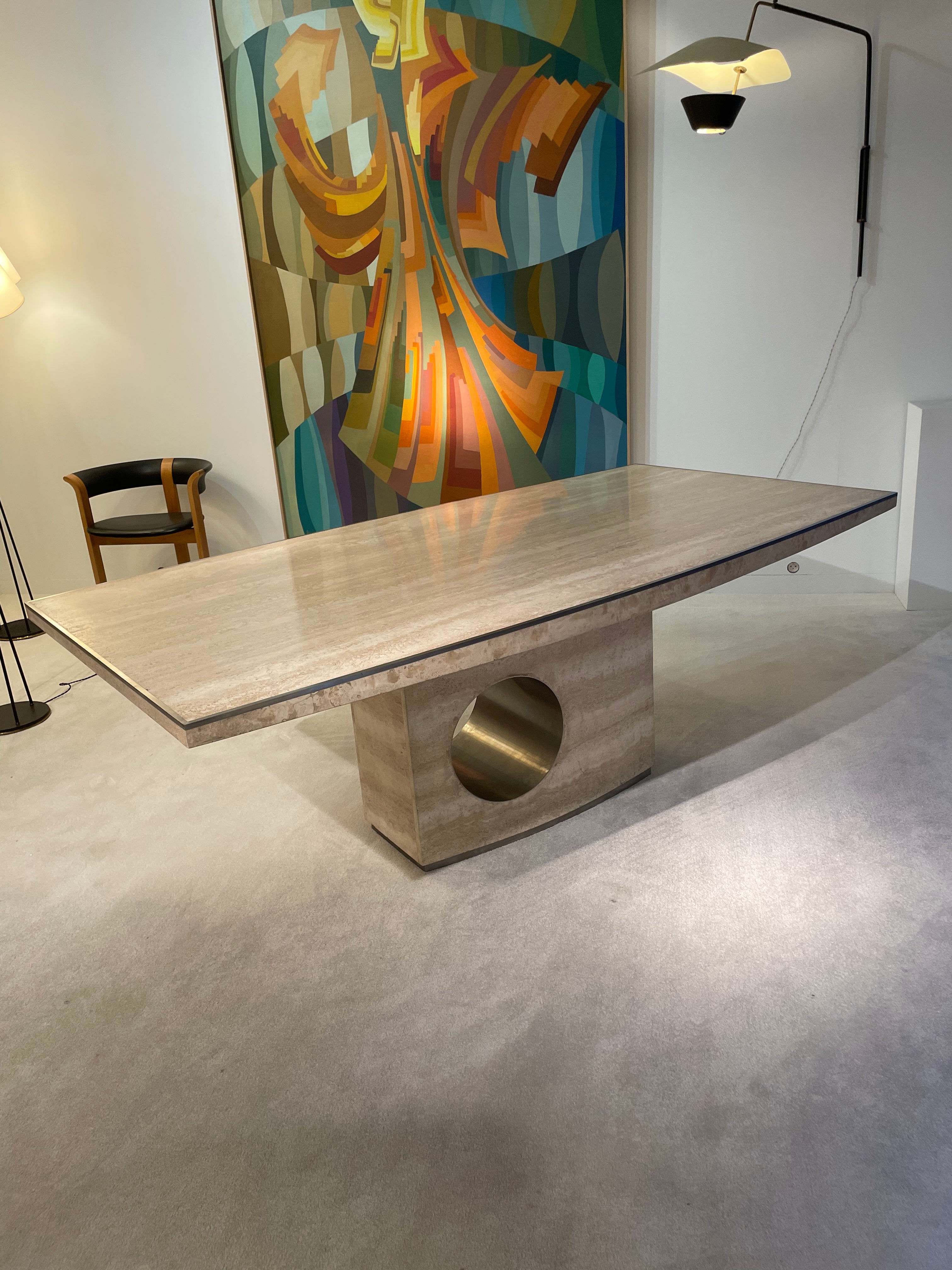 Dinning table by Willy Rizzo 
In travertine and Inox 
from 1970.