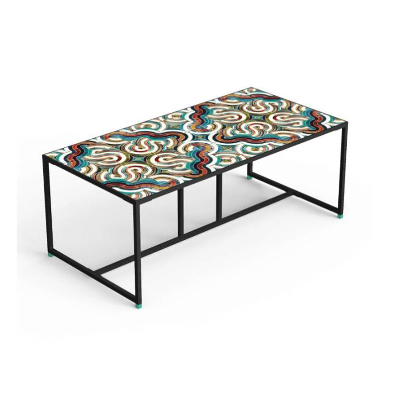 Caldas dining table is a piece that combines Bistrot inspired bases with handmade Portuguese tile tops, in various designs and colors. Its vibrance and color will stand out in any space, perfect for restaurants and cafes. Made to Order.

top: