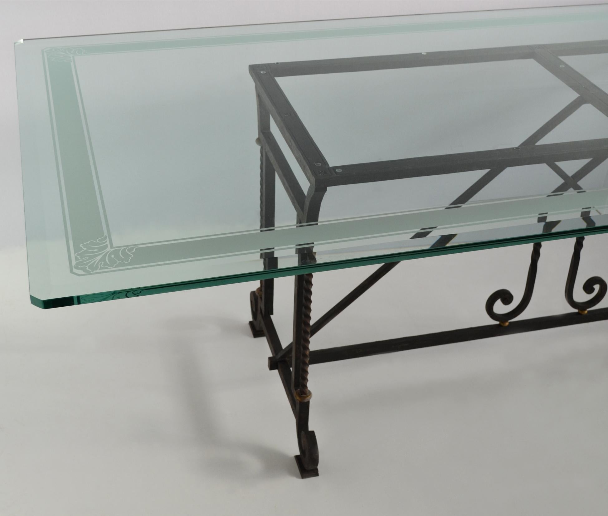 Special rectangular dining table composed by an extra light crystal  top with a sandblasted handmade decoration in the perimeter of the top. The base is manufactured by our skilled craftmen in wrought iron and you can ask for customization the