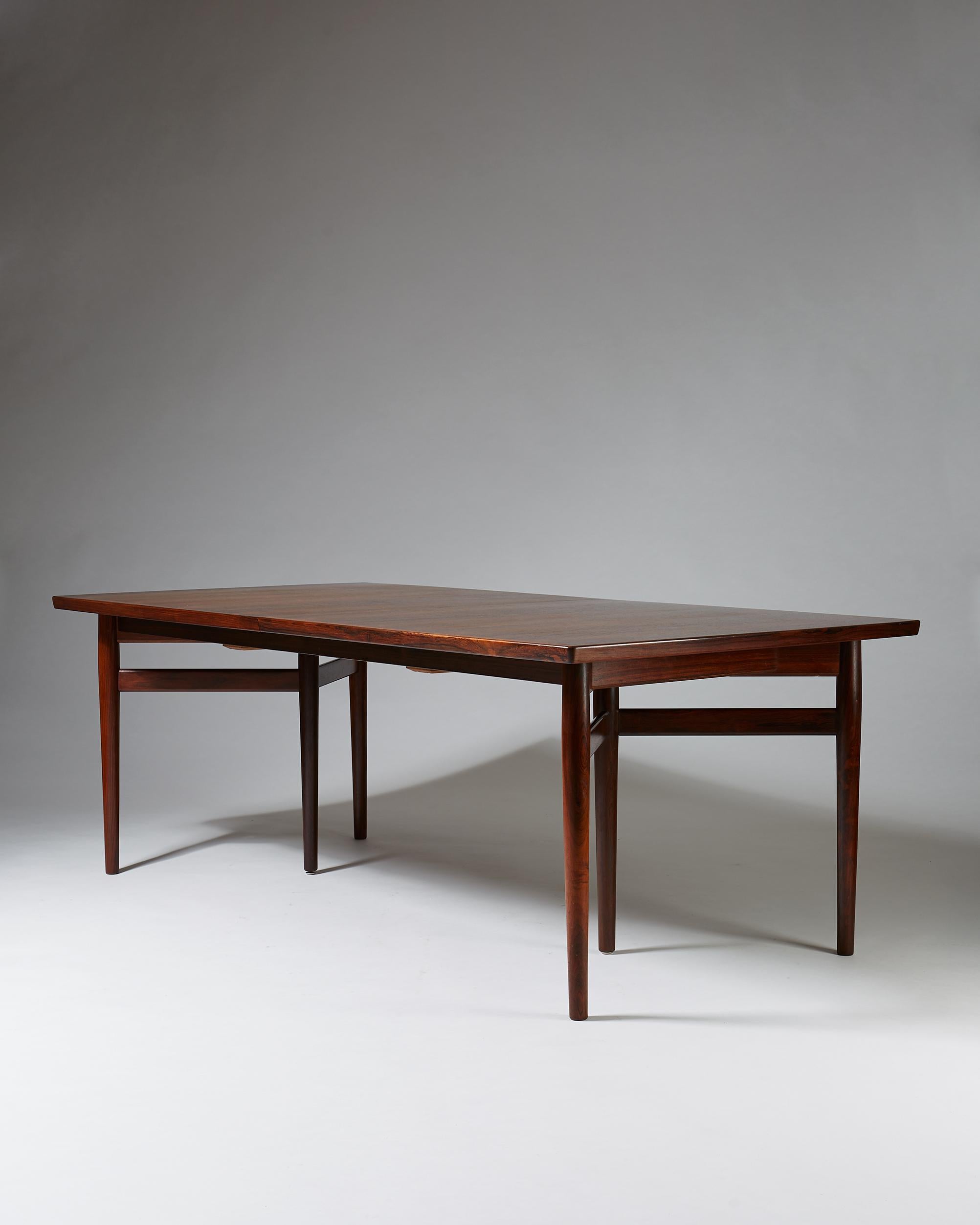 Dining table designed by Arne Vodder for Sibast,
Denmark, 1960s.

Rosewood.

Measurements: 
H: 72 cm/ 28 1/3
W: 103.5 cm/ 3' 4 3/4
