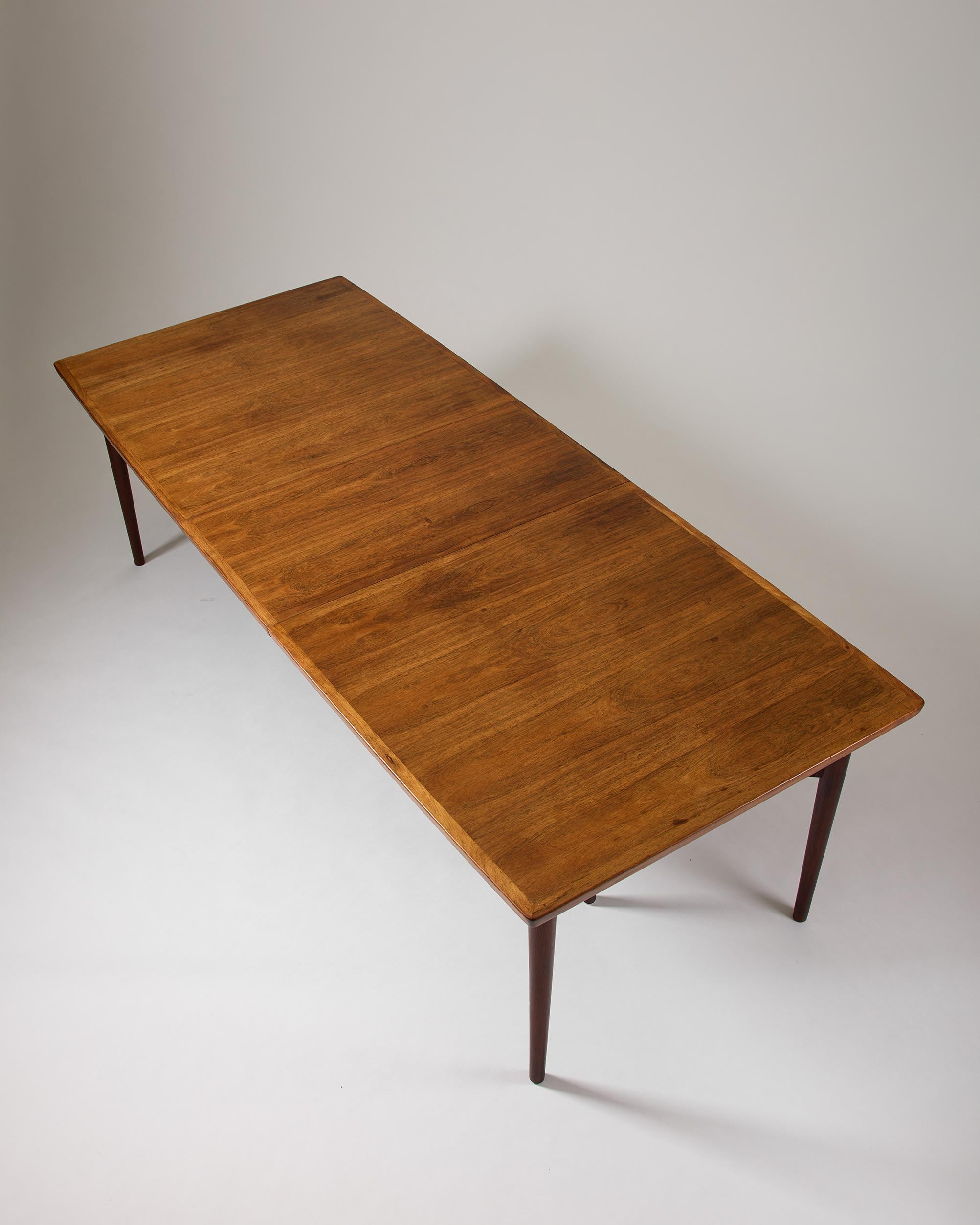 Rosewood Dining table designed by Arne Vodder for Sibast Denmark, 1960s.