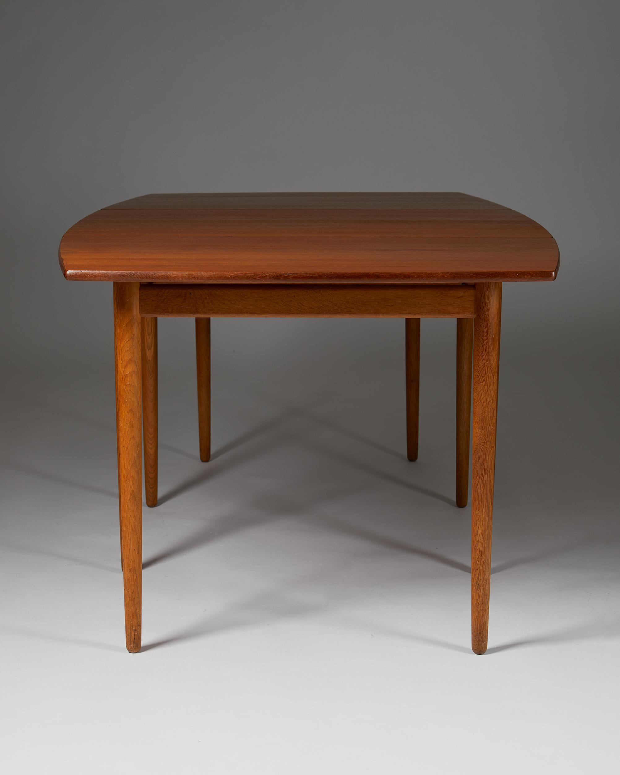 Danish Dining table designed by Hans J. Wegner for Andreas Tuck, Denmark, 1950s For Sale