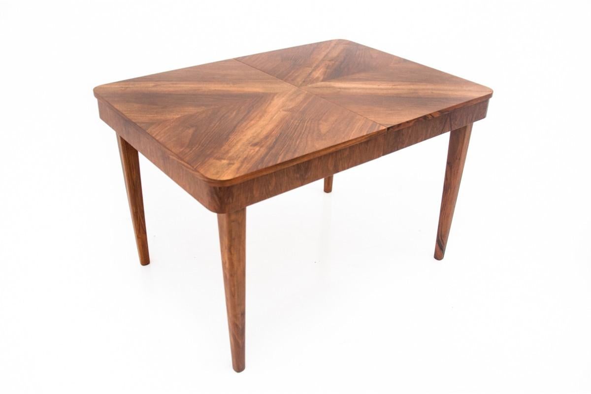 A rectangular extendable table designed by Jindrich Halabali in Czechoslovakia in the 1930s for the UP Zavody factory.

Table made of walnut wood. Preserved in very good condition, after professional renovation in our carpentry workshop. Finished in