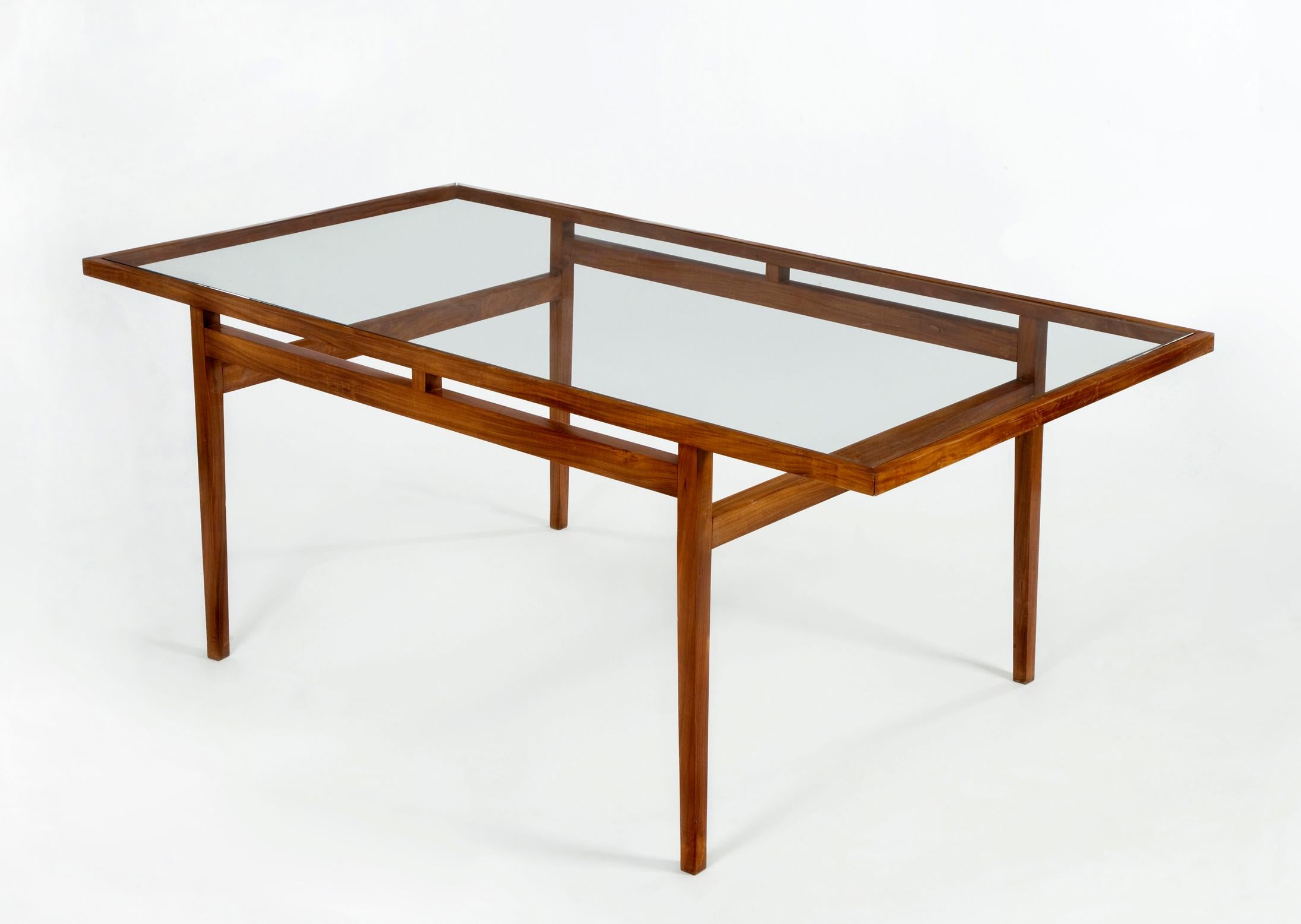 Dining table with frame in solid rosewood with glass top. Designed for Branco and Preto, Brazil, 1950s.