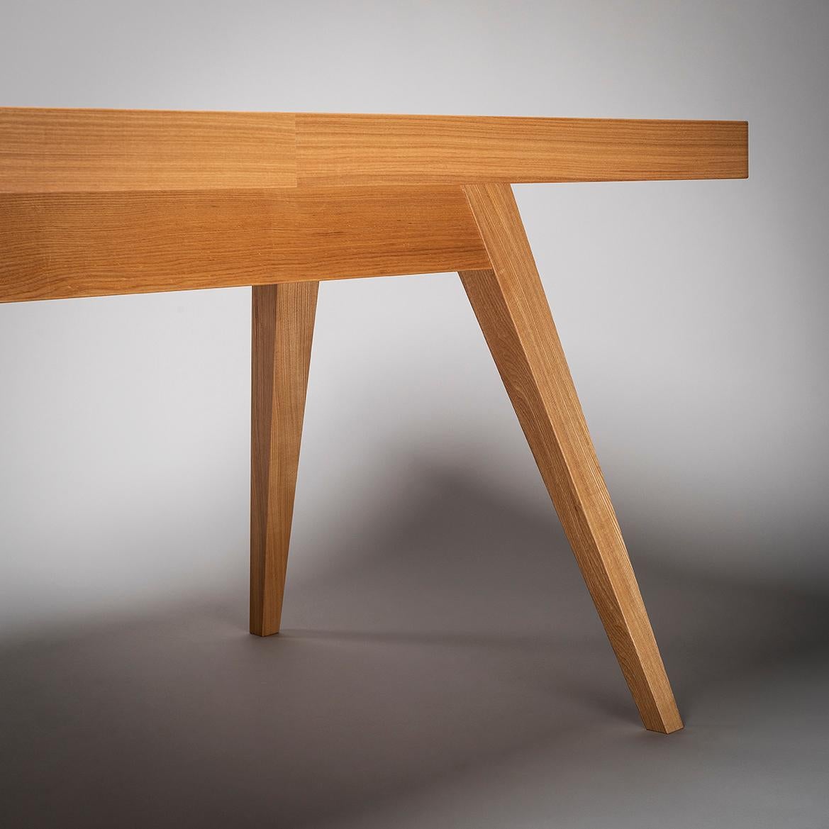 This dining table was designed by the architect Kenzo Tange for Tendo Mokko, a highly influential furniture company established by woodworkers in northern Japan in 1940. Amidst postwar rebuilding efforts and expanding consumerism in the 1950s and