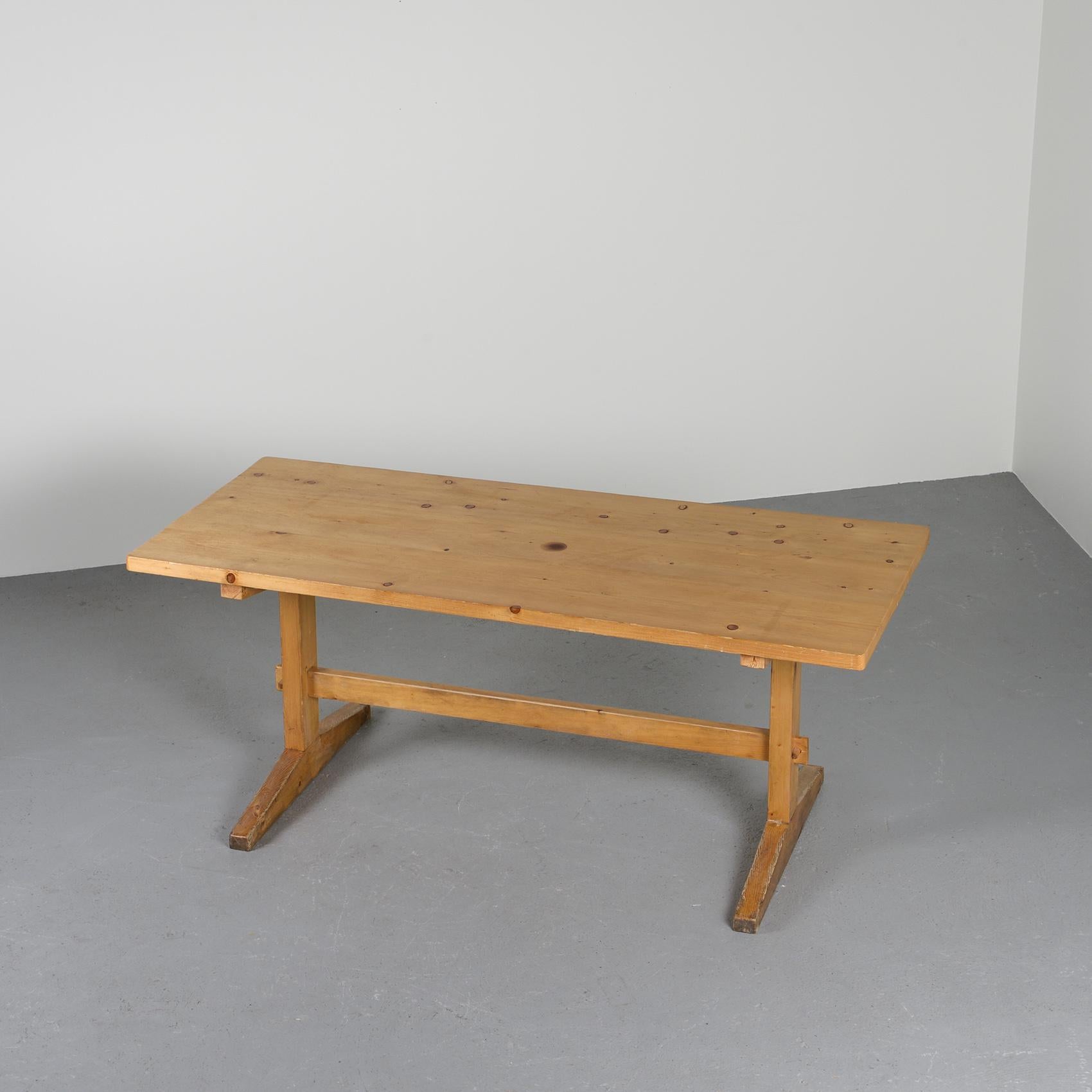 Dining table by Christian Durupt that will be perfect to welcome many guests.

It is made of solid pine wood and has a rectangular table top.

Origin: Méribel ski resort, French Alps, circa 1970.