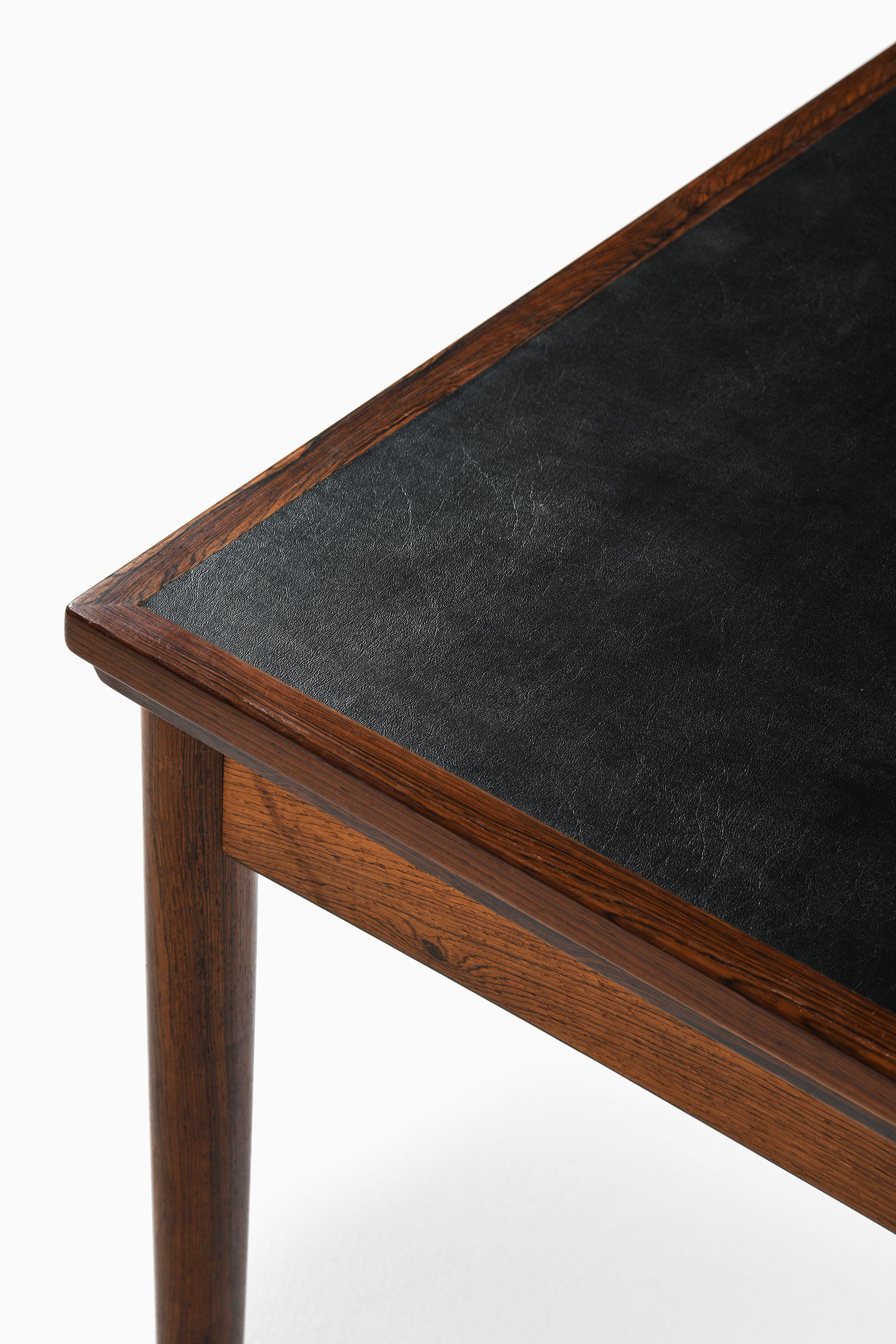 Mesa de comedor / mesa de juego en palisandro y cuero negro de Carlo Jensen, años 60 siglo XX en venta