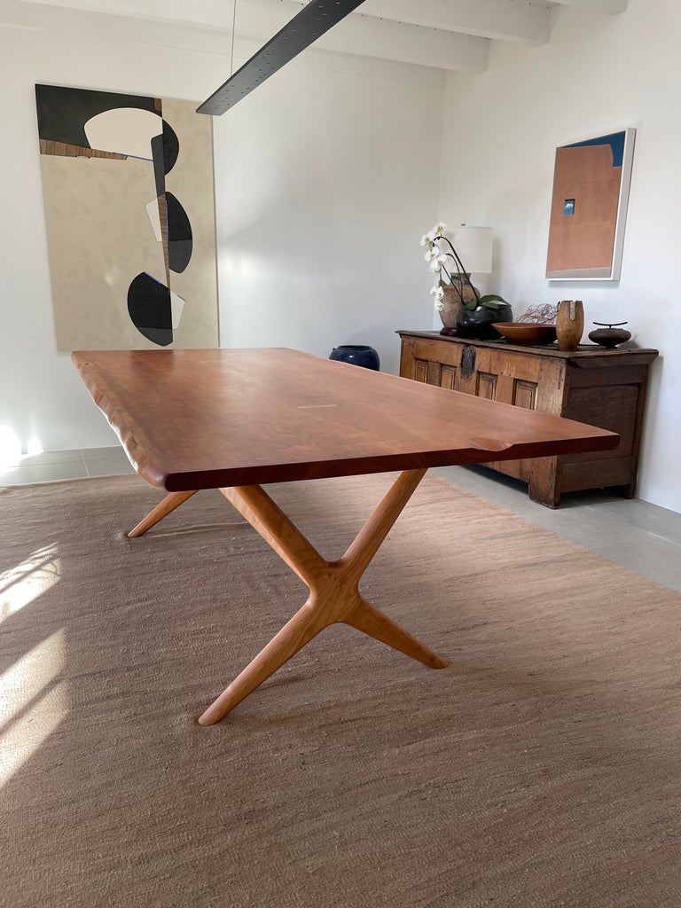 Our ‘X’ base dining table is one of our studio favorites. It has an organic sculptural quality and lightness while also being sturdy. The ‘X’ of the base is a showcase of careful joinery and countless hours with a spokeshave achieving the gentle