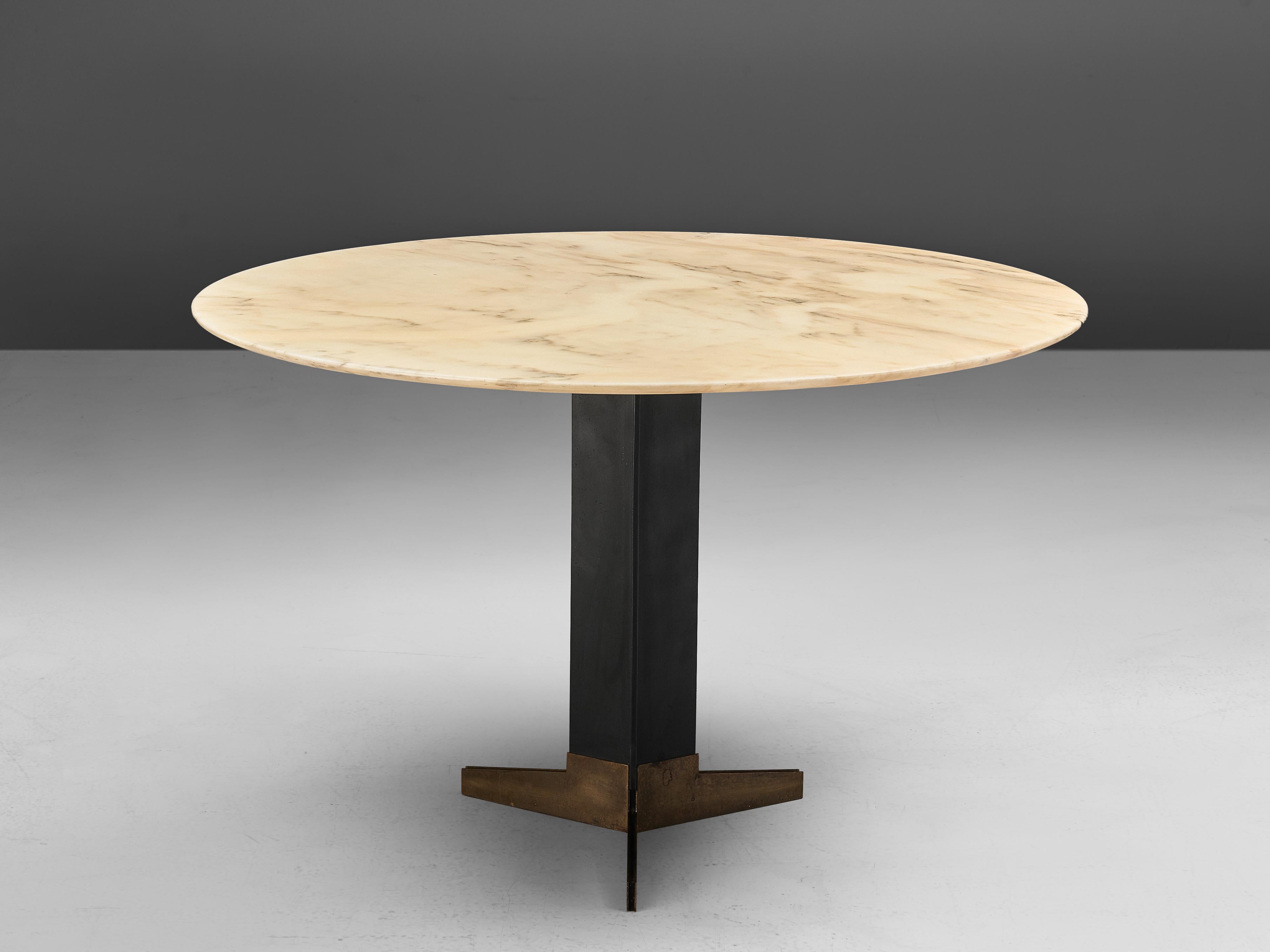 Attributed to Ignazio Gardella, dining table, marble, brass, metal, Italy, circa 1958

Breathtaking round dining or center table that convinces through the stunning mix of materials and colors used. A circular pedestal table with a refined black