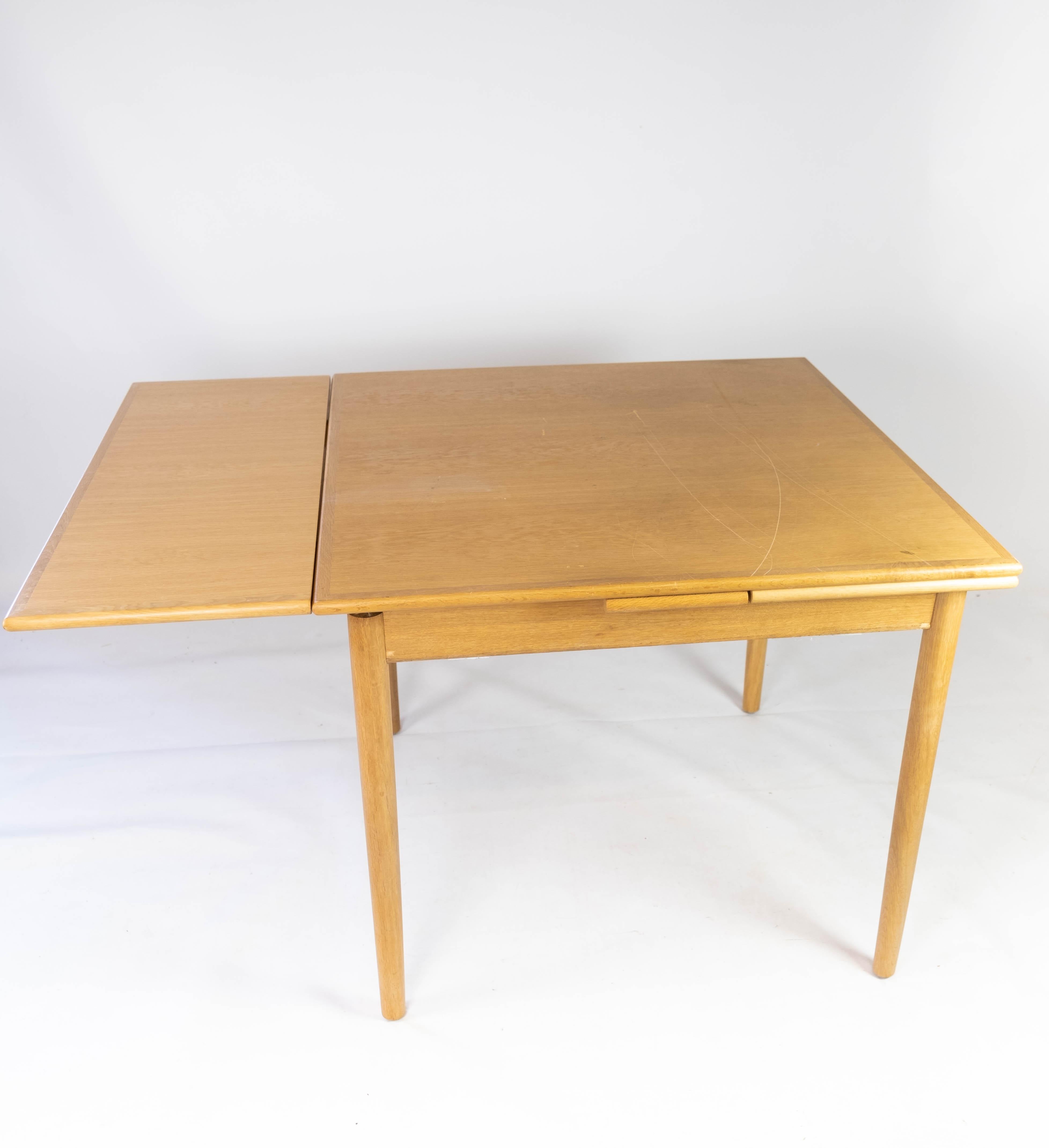 Mid-20th Century Dining Table Made In Oak With Extensions, Danish Design From 1960s For Sale
