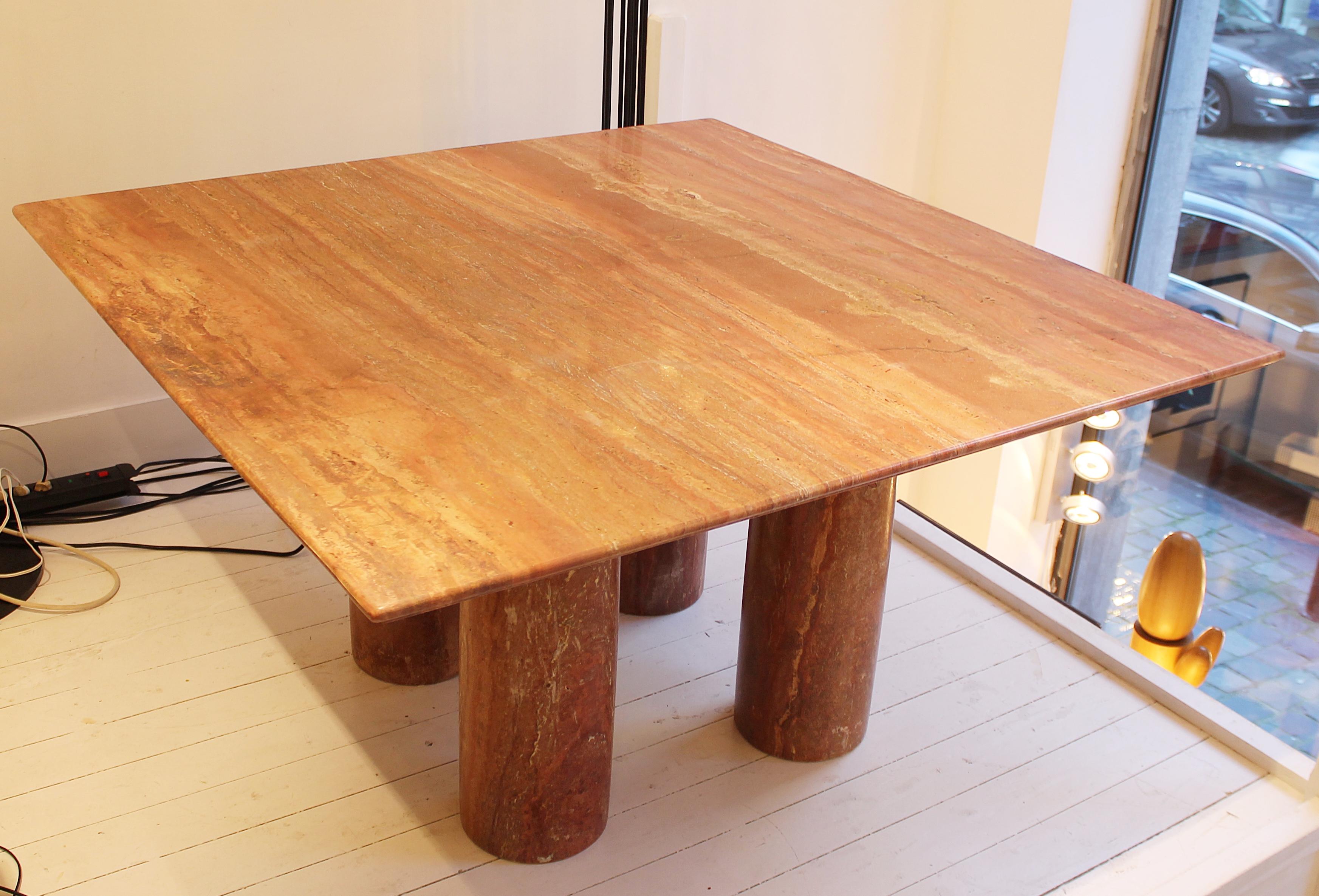 Dining table in red travertine 'Il collonato' by Mario Bellini, Italy, 1970s.