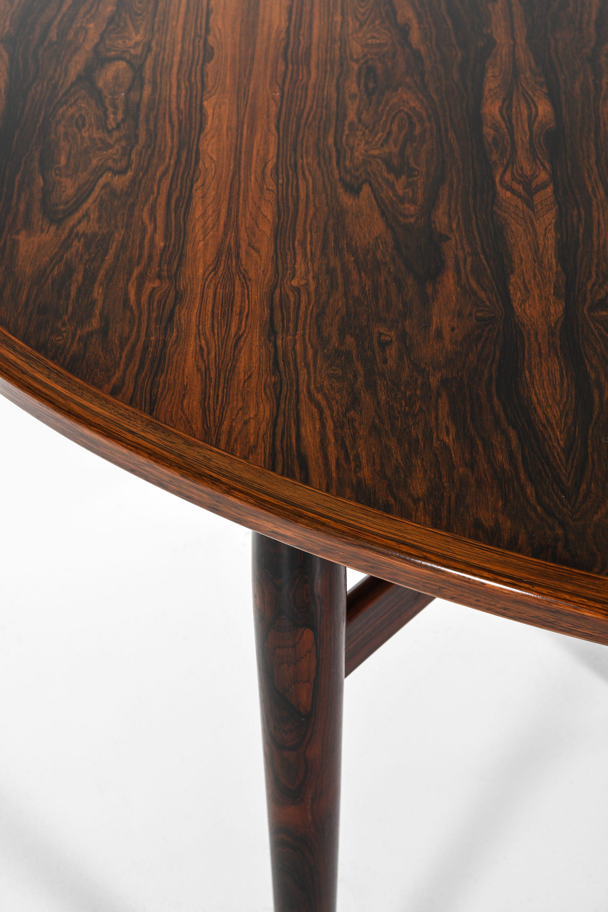 Table de salle à manger en bois de rose et cuir d'Arne Vodder, années 1950 Bon état - En vente à Limhamn, Skåne län
