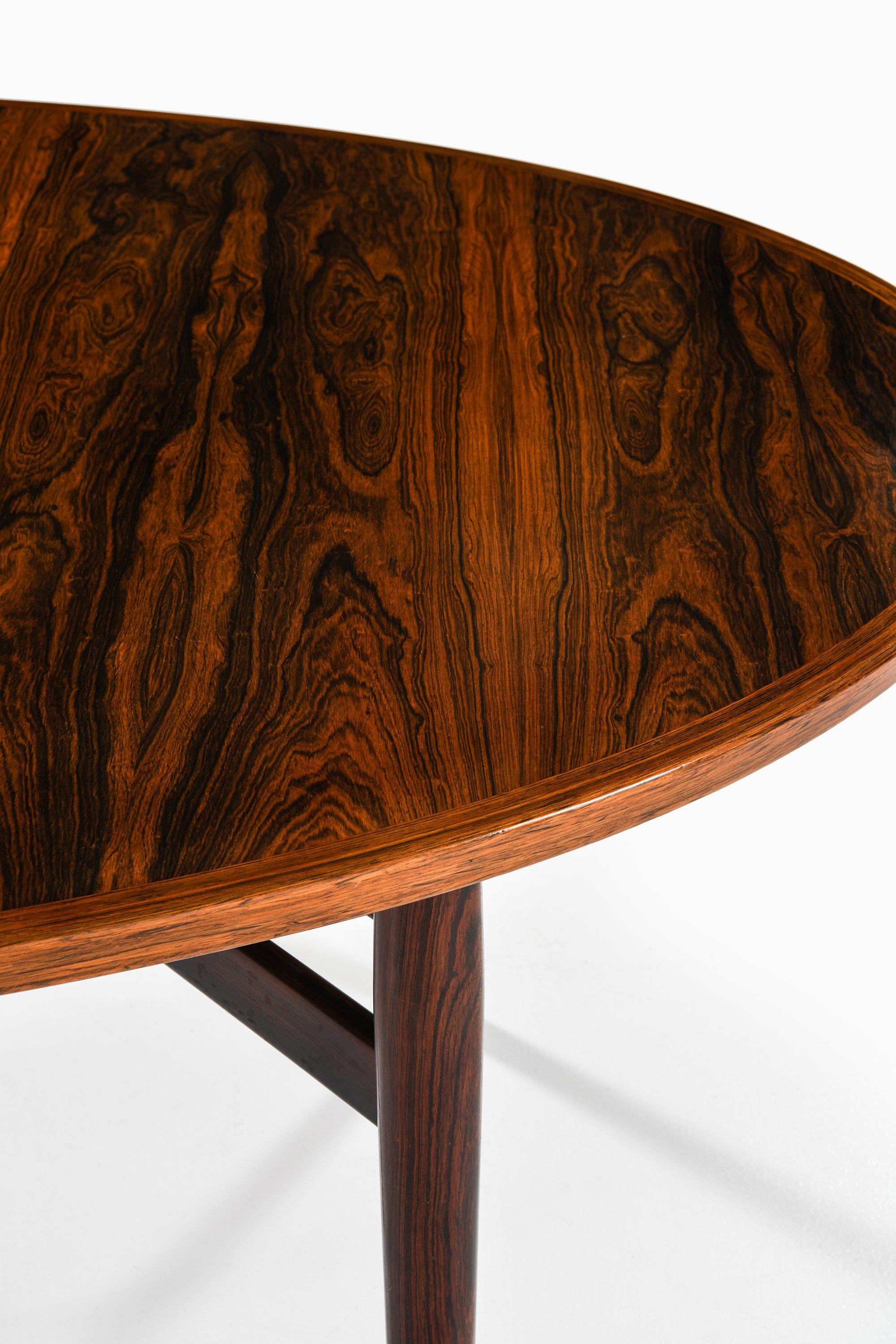 Table de salle à manger en bois de rose et cuir d'Arne Vodder, années 1950 en vente 1