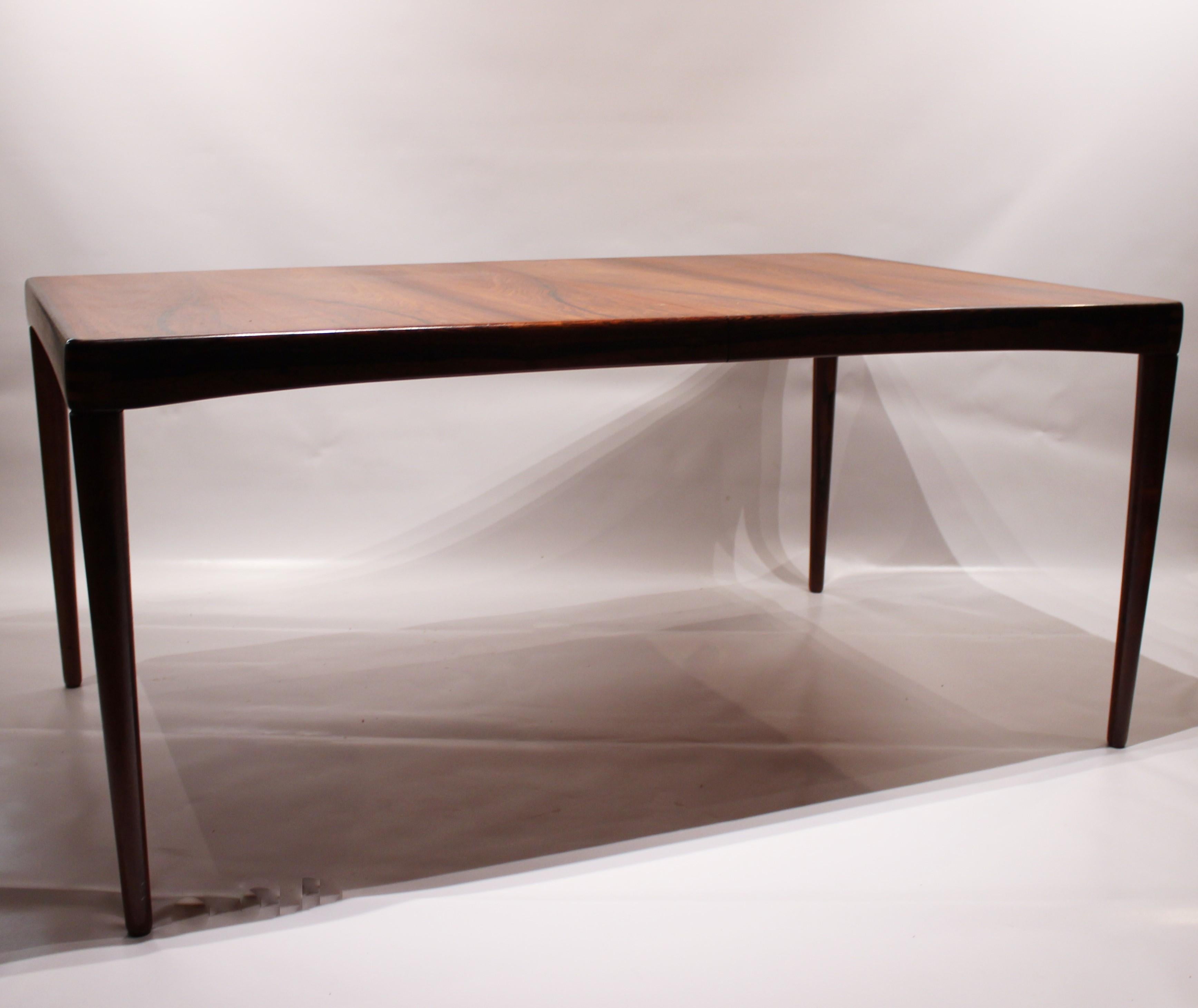 Dining table in rosewood designed by H.W. Klein and manufactured by Bramin furniture factory the 12th of October 1966. The table has one extension leaf and in great vintage condition.